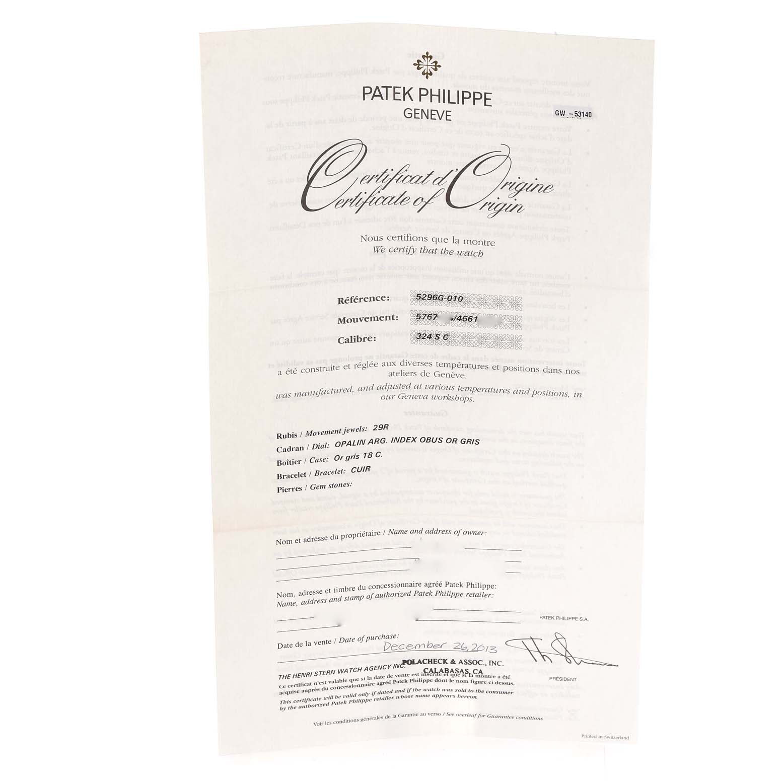 This image shows the Certificate of Origin for a Patek Philippe Calatrava 5296G-010 Men's White Gold Silver Dial 5296G-010 Men's White Gold Silver Dial watch, detailing references, movement, and other specifications.