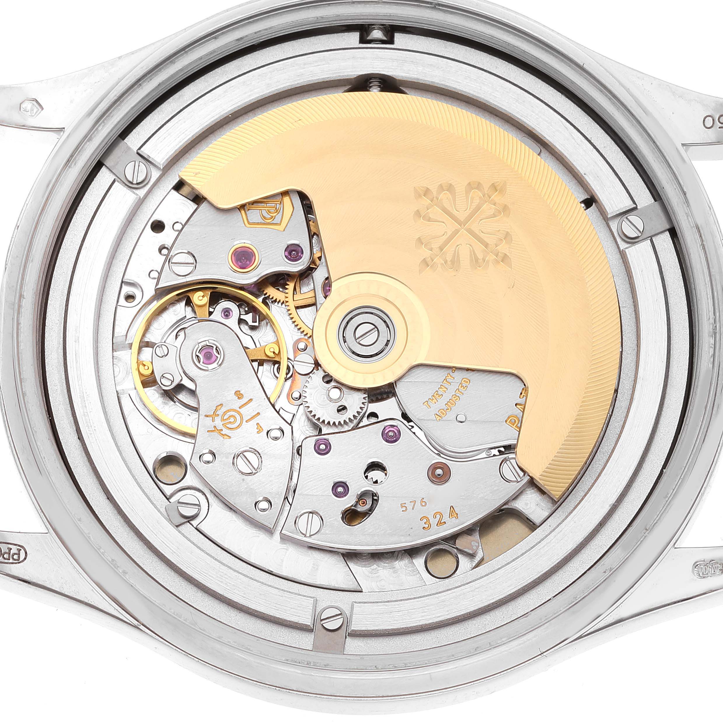 This image shows the intricate movement and mechanism of the Patek Philippe Calatrava 5296G-010 Men's White Gold Silver Dial 5296G-010 Men's White Gold Silver Dial watch from the back angle.