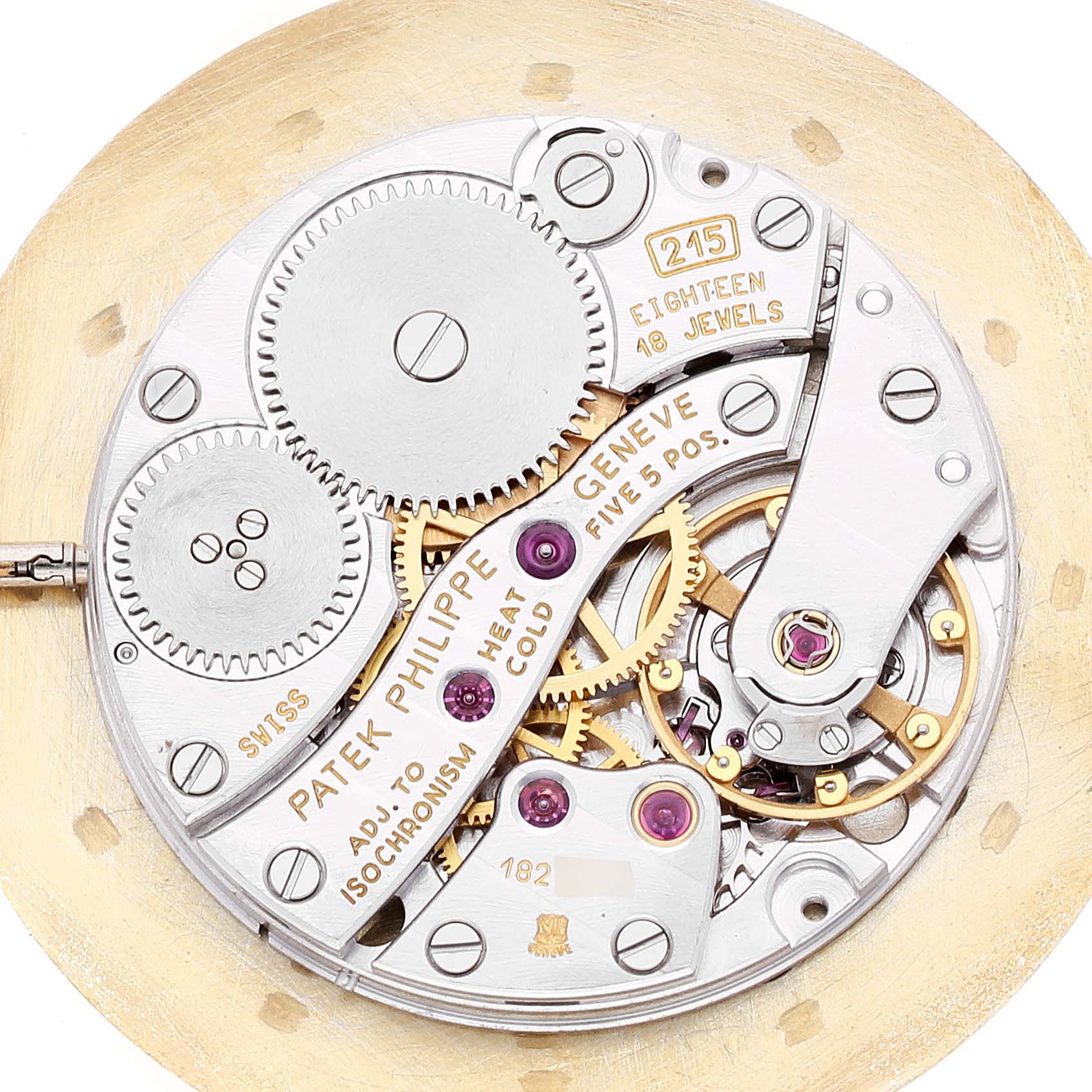This image shows the intricate inner workings of a Patek Philippe Calatrava 3893/1 Men's Yellow Gold White Dial 3893/1 Men's Yellow Gold White Dial watch movement from a top-down angle.
