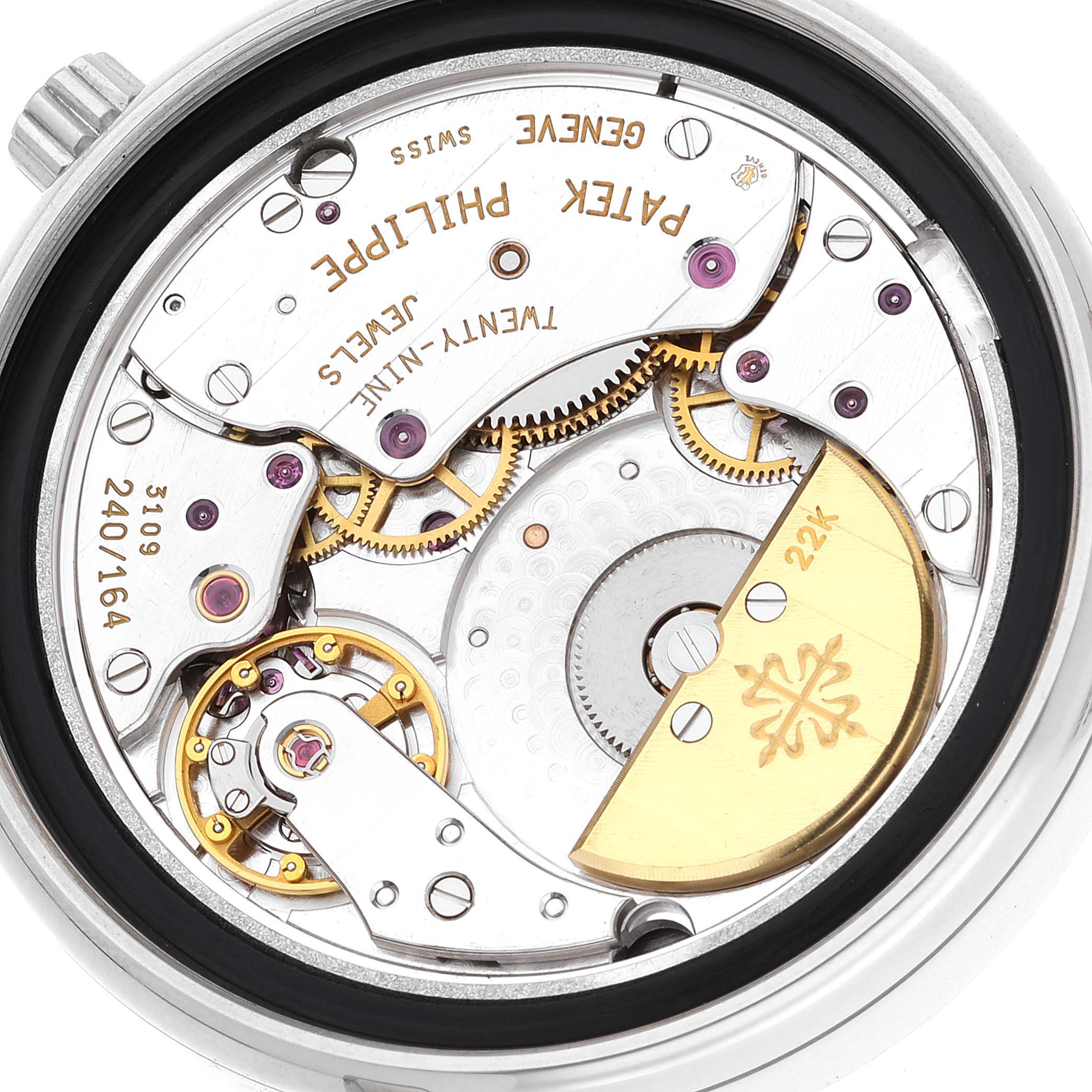 This image shows the intricate interior mechanics of the Patek Philippe Complications 5055G-001 Men
s White Gold Black Dial 5055G-001 Men
s White Gold Black Dial model, viewed from the back.