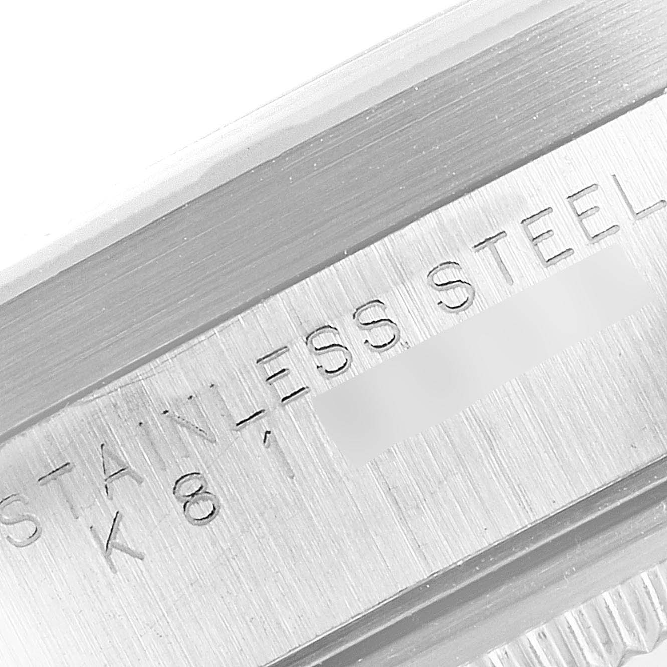 This close-up image shows the stainless steel case back of a Rolex Air-King 14010 Men's Stainless Steel Blue Dial 14010 Men's Stainless Steel Blue Dial watch.