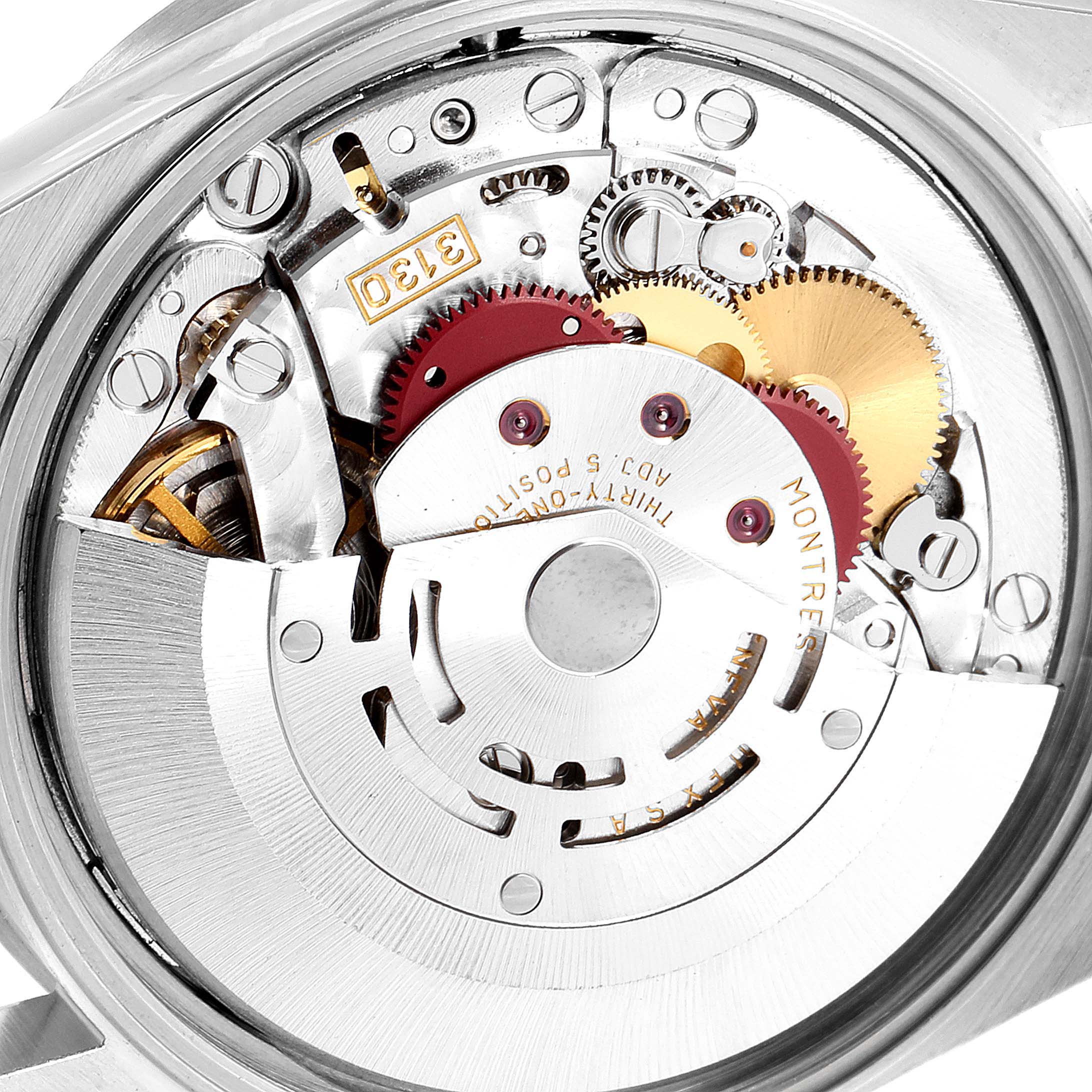 This image shows an interior angle of a Rolex Air-King 14010 Men's Stainless Steel Blue Dial 14010 Men's Stainless Steel Blue Dial watch, highlighting its intricate gears and mechanical components.