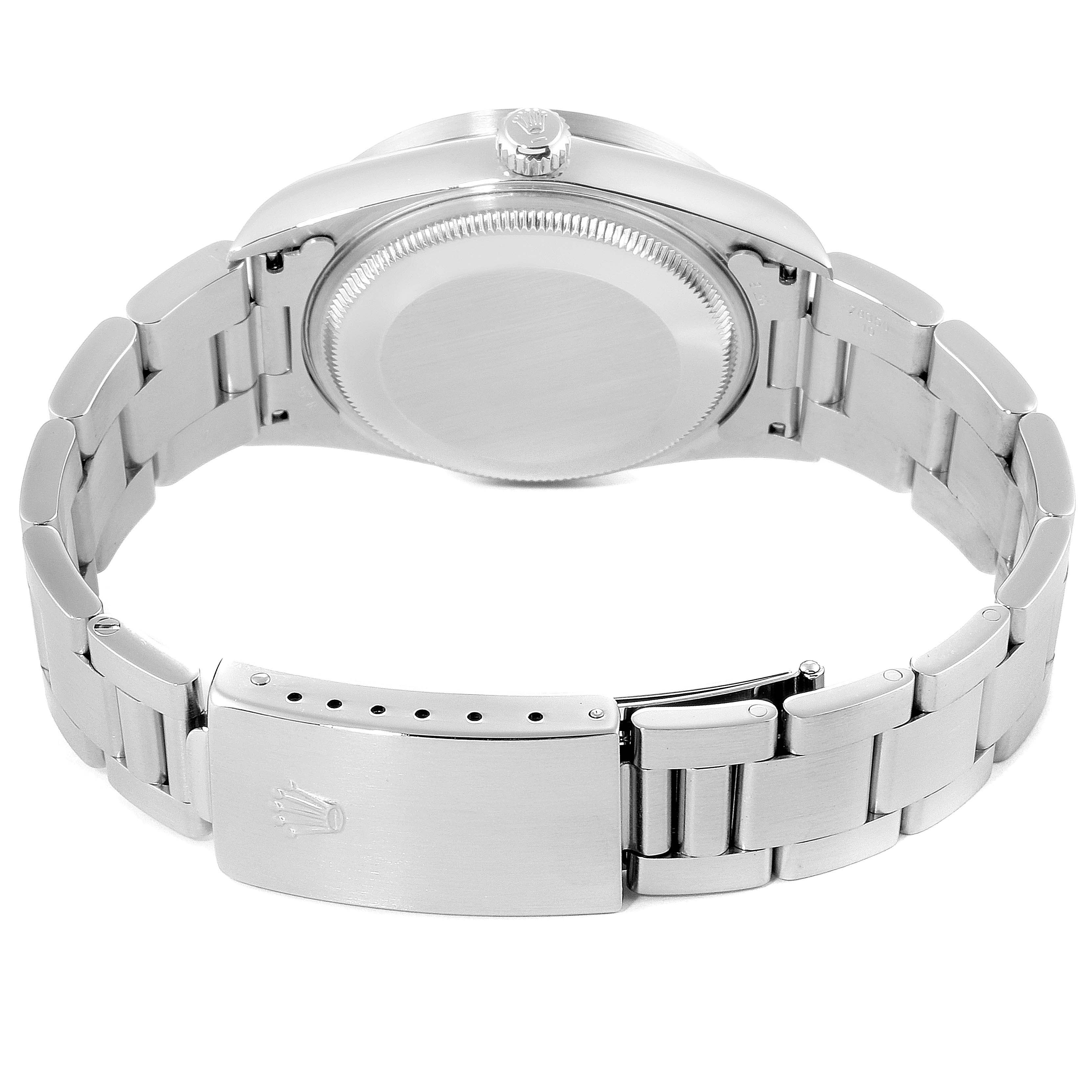 This image shows the back case and bracelet clasp of the Rolex Air-King 14010 Men's Stainless Steel Blue Dial 14010 Men's Stainless Steel Blue Dial watch.