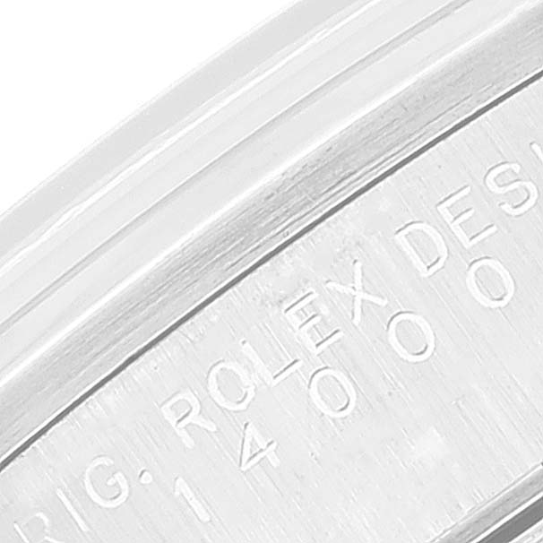 The image shows a close-up of the engraved serial number and "ROLEX" brand on the side of the bezel of a Rolex Air-King 14000M Men's Stainless Steel Black Dial 14000M Men's Stainless Steel Black Dial watch.