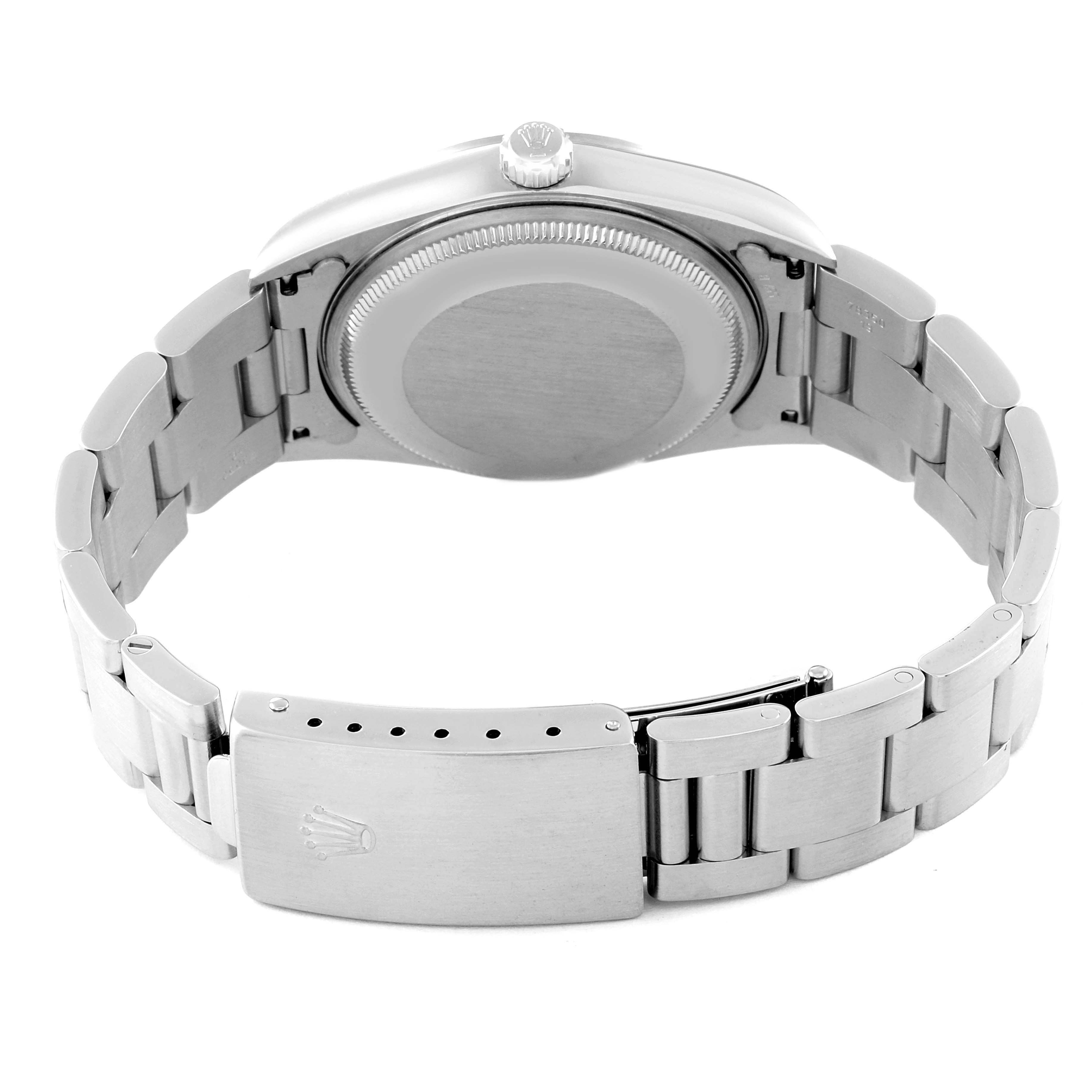 The image shows the back of the Rolex Air-King 14000M Men's Stainless Steel Black Dial 14000M Men's Stainless Steel Black Dial watch, highlighting the case back and partially opened clasp.