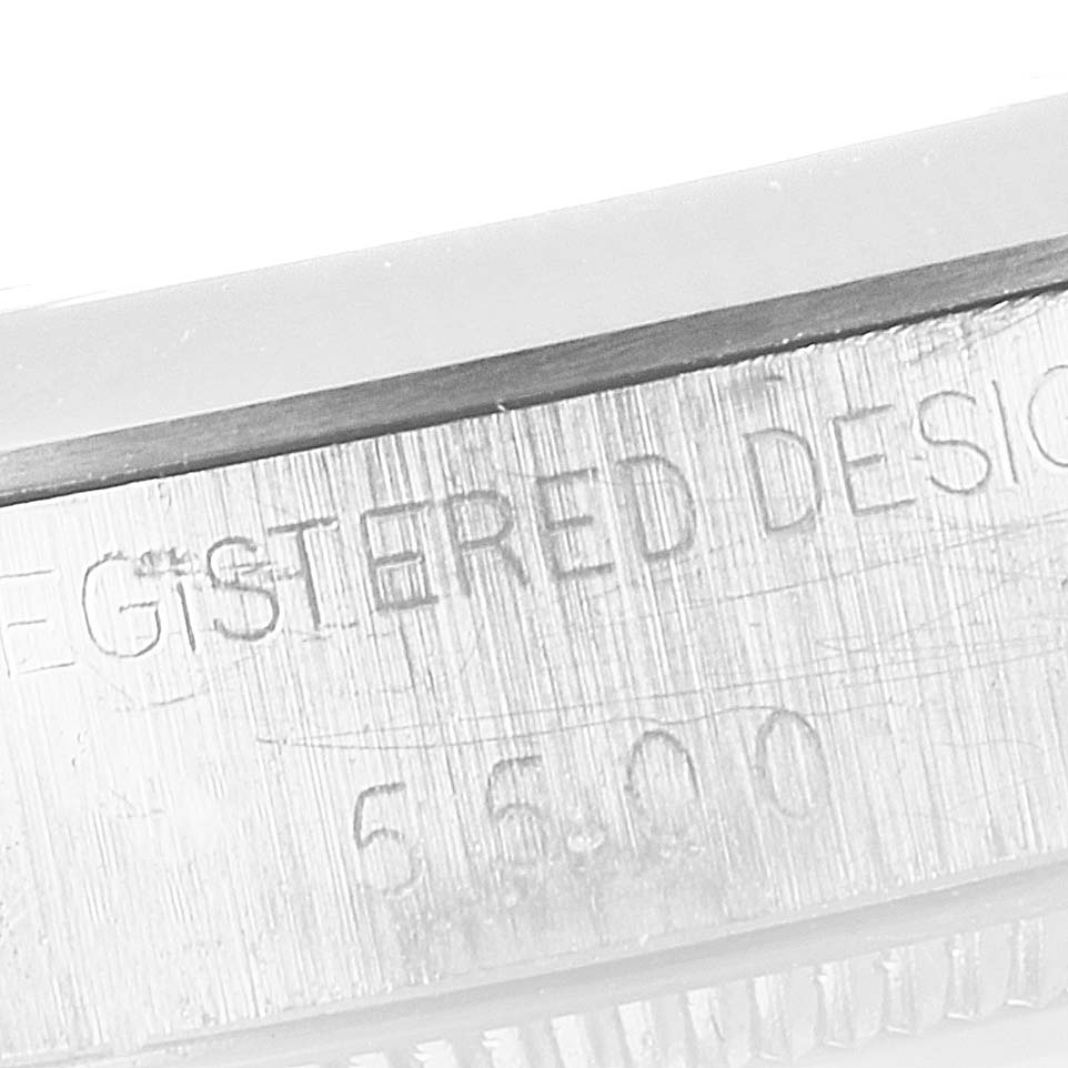 This image shows a close-up of the casing, focusing on the engraving of a Rolex Vintage Collection 5500 Men's Stainless Steel Silver Dial 5500 Men's Stainless Steel Silver Dial model.