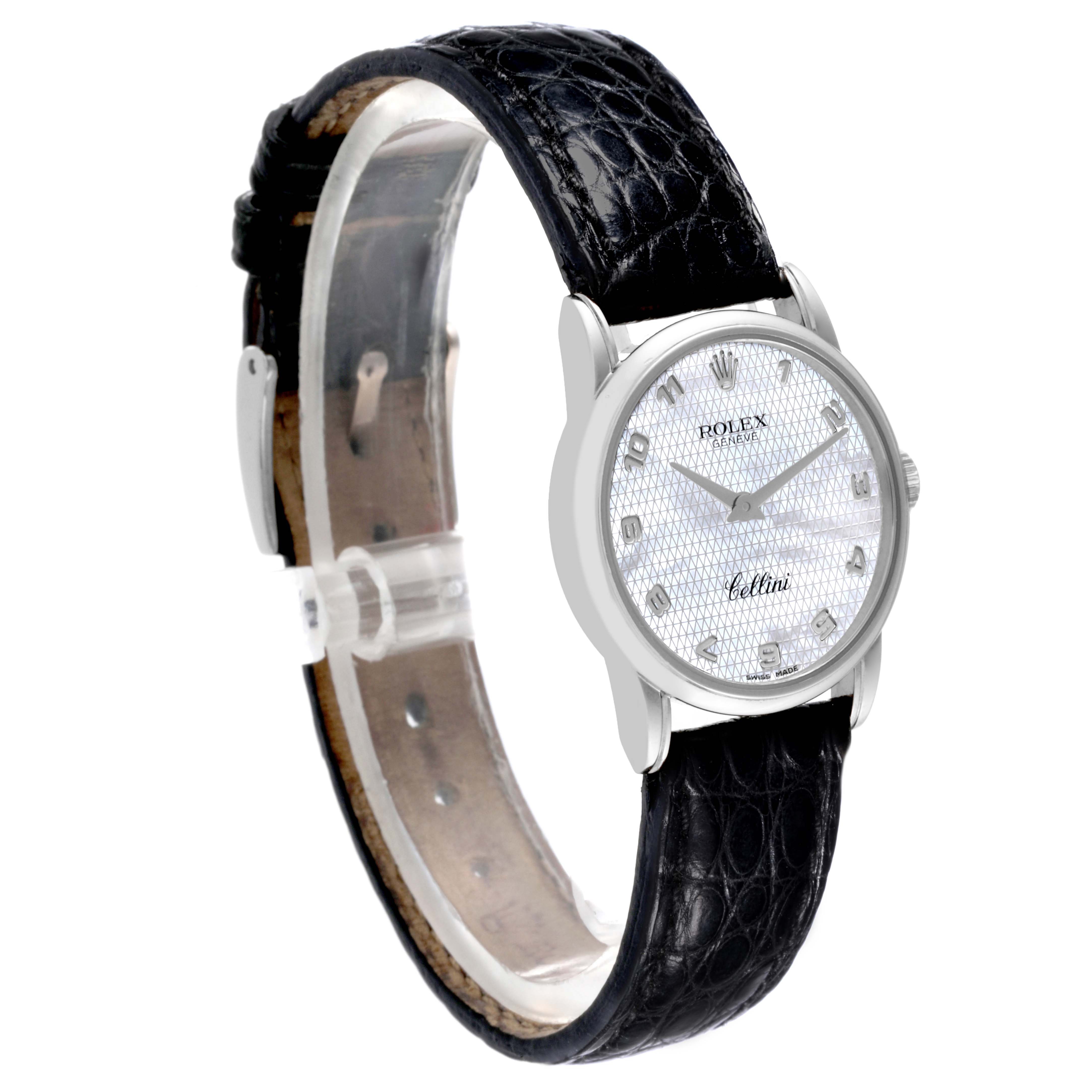 This image shows a side angle of a Rolex Cellini 6111 Women's White Gold Mother of Pearl Dial 6111 Women's White Gold Mother of Pearl Dial watch, highlighting its dial, hands, and black leather strap.