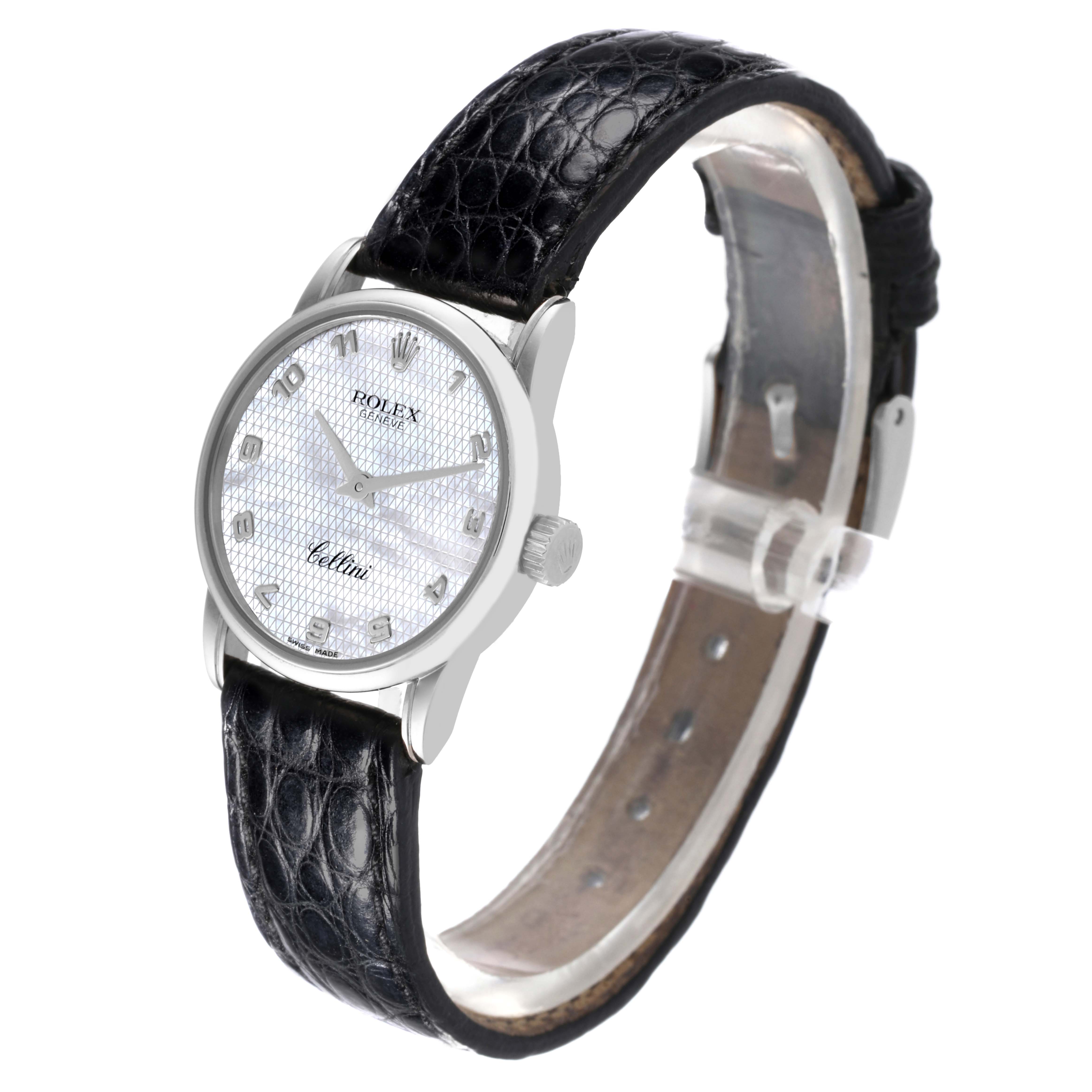 The Rolex Cellini 6111 Women's White Gold Mother of Pearl Dial 6111 Women's White Gold Mother of Pearl Dial model watch is shown at a slight angle, displaying the watch face, crown, case, and black leather strap.