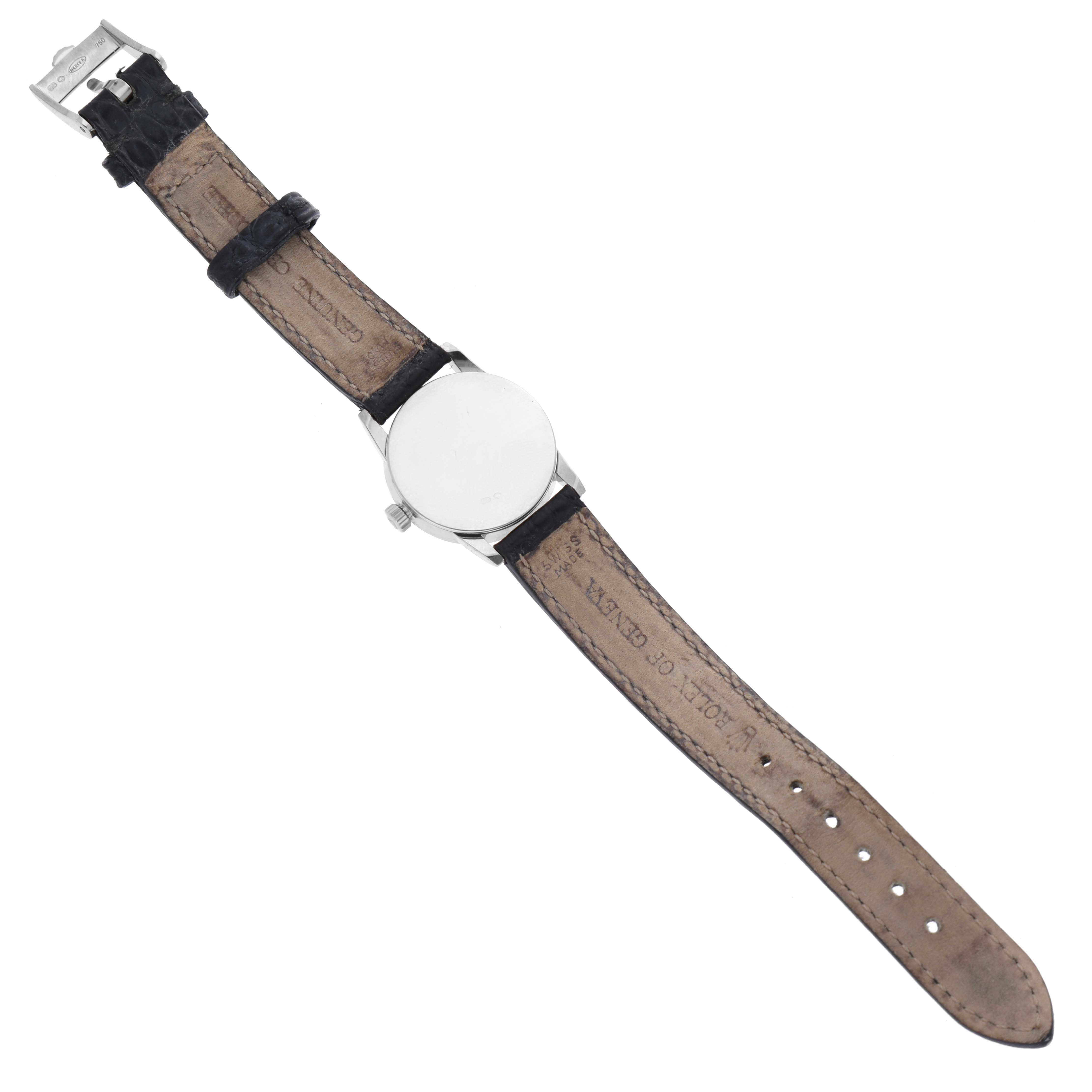 The image shows the back of a Rolex Cellini 6111 Women's White Gold Mother of Pearl Dial 6111 Women's White Gold Mother of Pearl Dial watch, highlighting its leather strap and clasp.