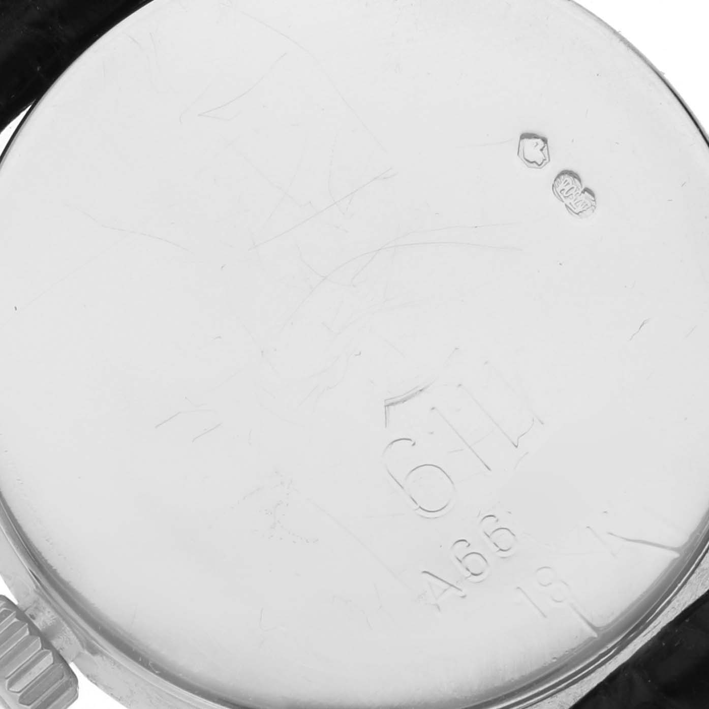 This image shows the back case of a Rolex Cellini 6111 Women's White Gold Mother of Pearl Dial 6111 Women's White Gold Mother of Pearl Dial watch, viewed from a top-down angle.