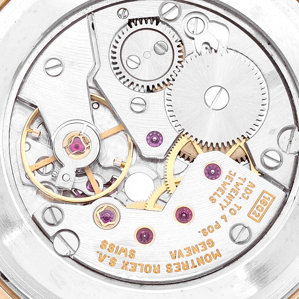 This close-up image shows the intricate internal mechanism of a Rolex Cellini 5112 Men's Yellow Gold Beige Dial 5112 Men's Yellow Gold Beige Dial watch movement.
