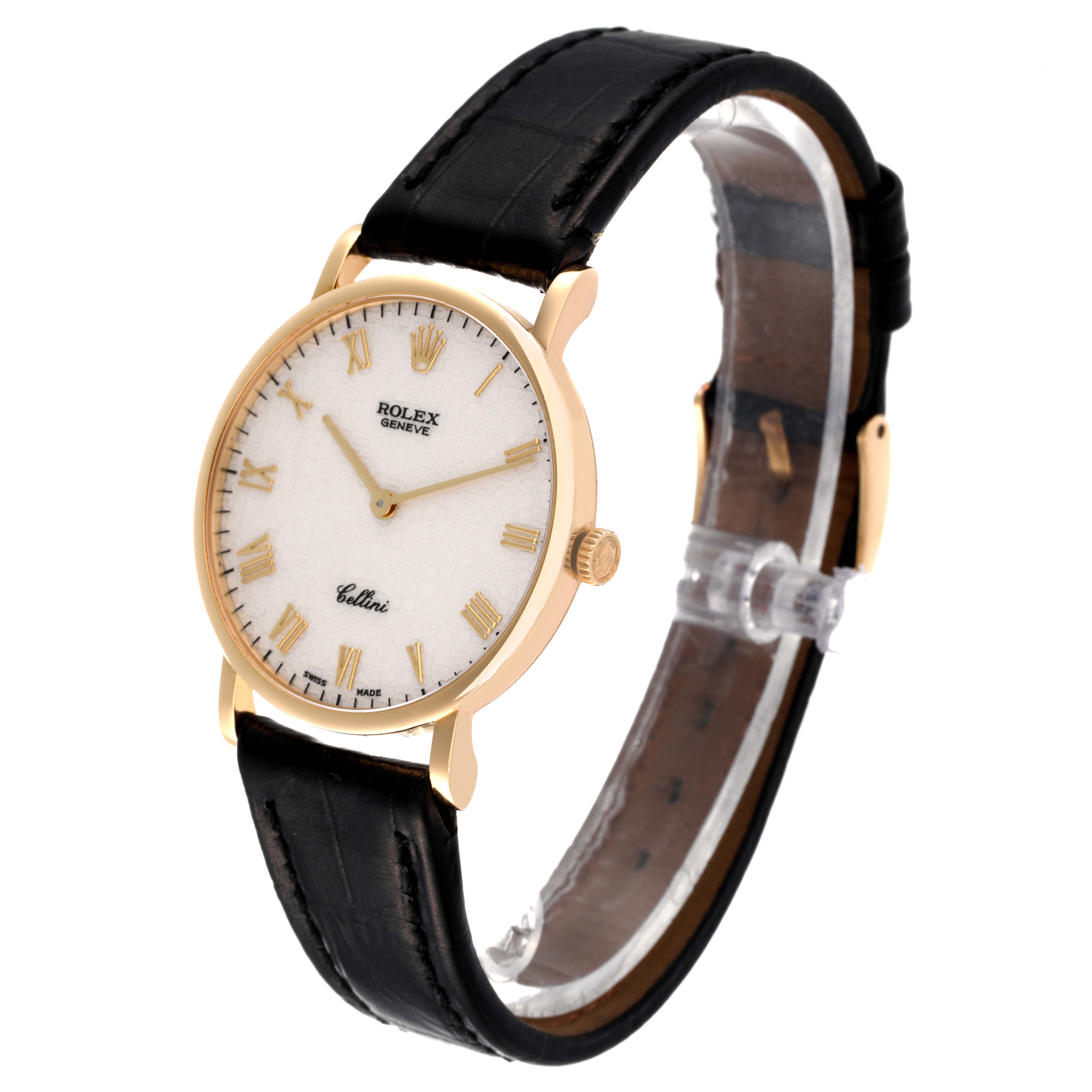 The Rolex Cellini 5112 Men's Yellow Gold Beige Dial 5112 Men's Yellow Gold Beige Dial watch is shown at an angle highlighting the face, side, and black leather strap with a gold casing.