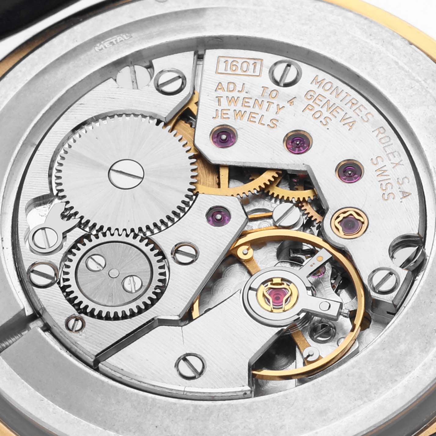 The image shows a close-up view of the Rolex Cellini 5112 Men's Yellow Gold Mother of Pearl Dial 5112 Men's Yellow Gold Mother of Pearl Dial's intricate movement mechanism and components.