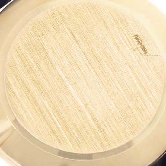 This image shows the back of a Rolex Cellini 5112 Men's Yellow Gold Mother of Pearl Dial 5112 Men's Yellow Gold Mother of Pearl Dial watch, focusing on the brushed gold case and hallmark.