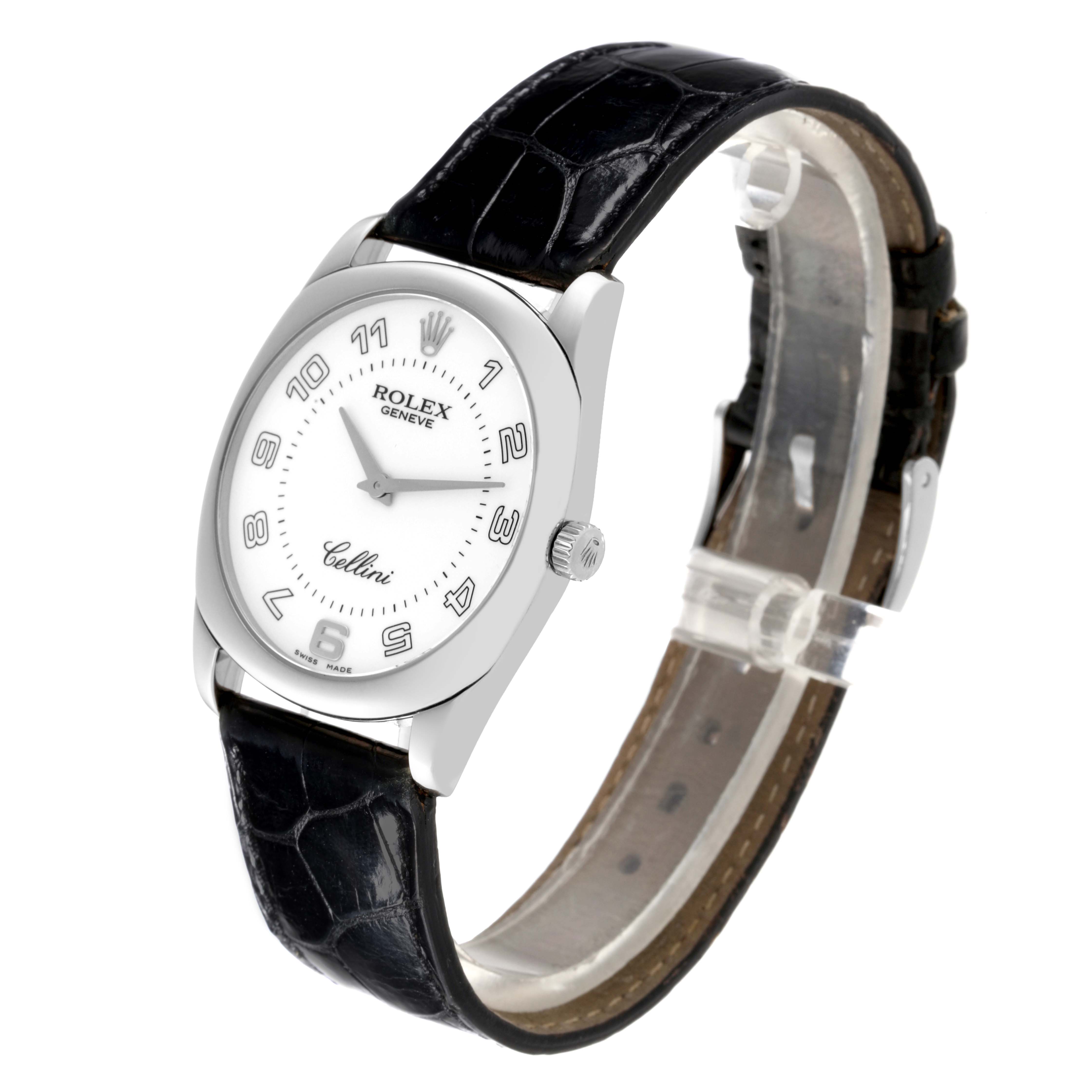 The image shows a Rolex Cellini 4233/9 Men's White Gold White Dial 4233/9 Men's White Gold White Dial watch from a side angle, displaying its face, crown, and black leather strap.