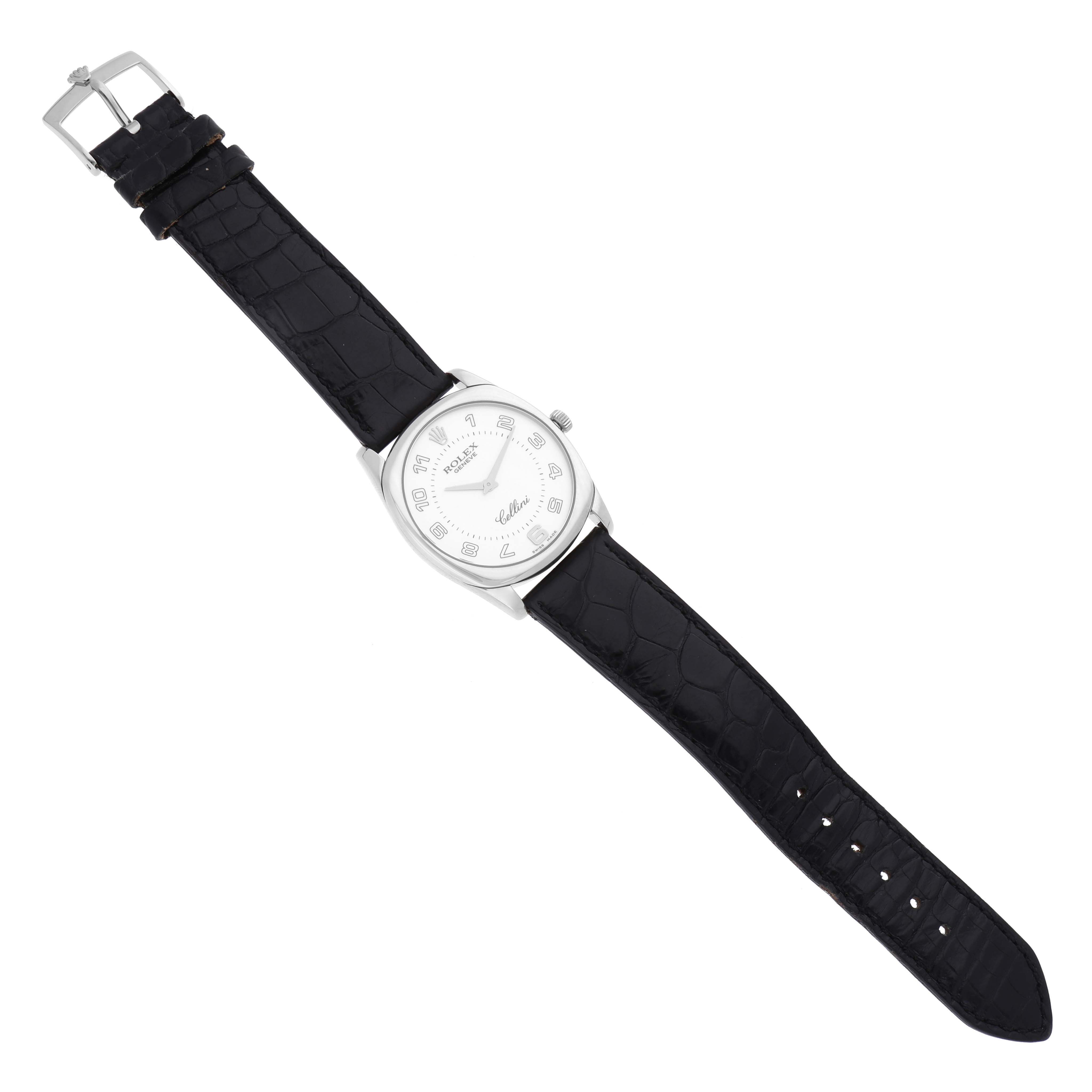The image shows a Rolex Cellini 4233/9 Men's White Gold White Dial 4233/9 Men's White Gold White Dial watch from a top-down angle, displaying its face, black leather strap, and buckle.