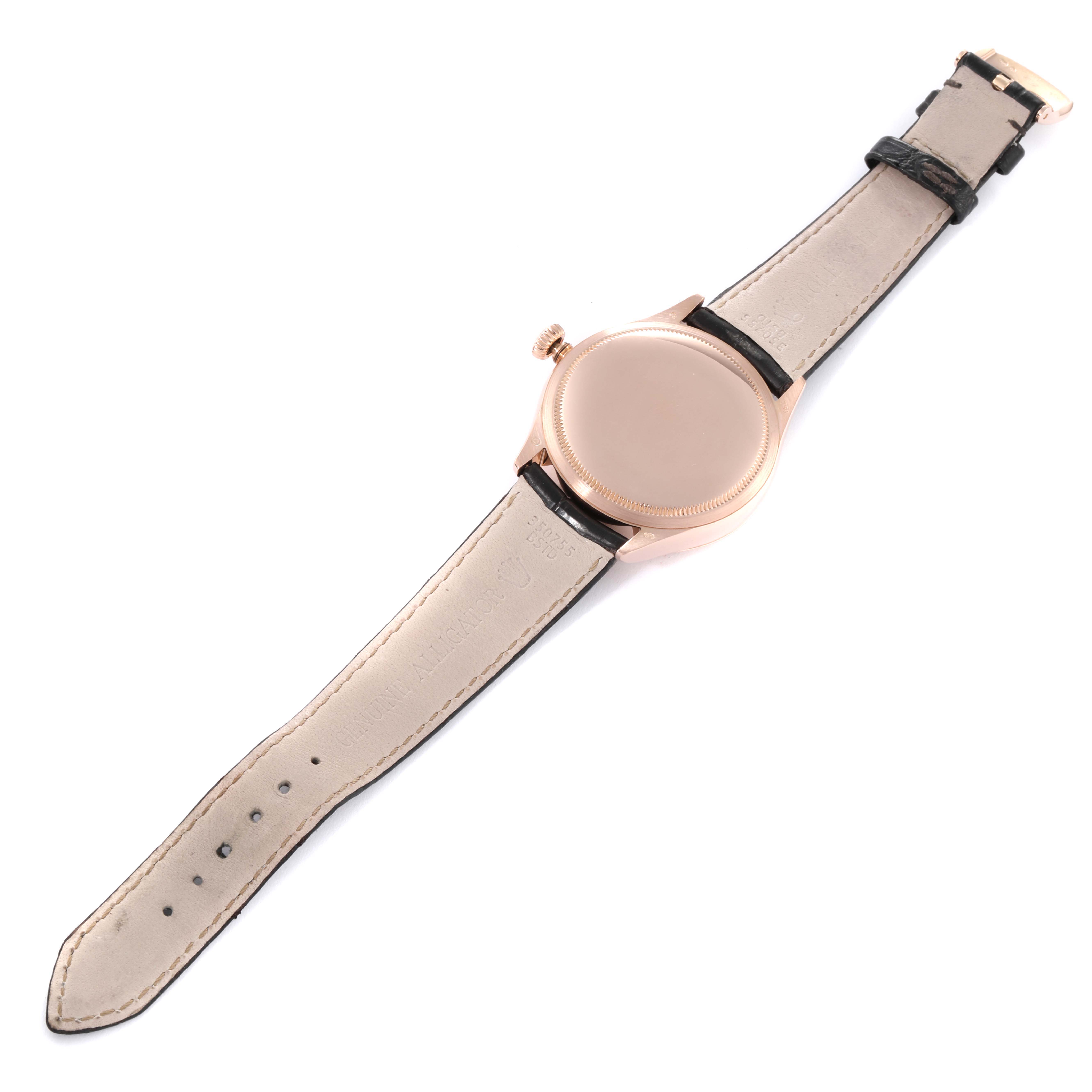 This is a back view of a Rolex Cellini 50515 Men's Rose Gold Silver Dial 50515 Men's Rose Gold Silver Dial watch, showing the strap and caseback.