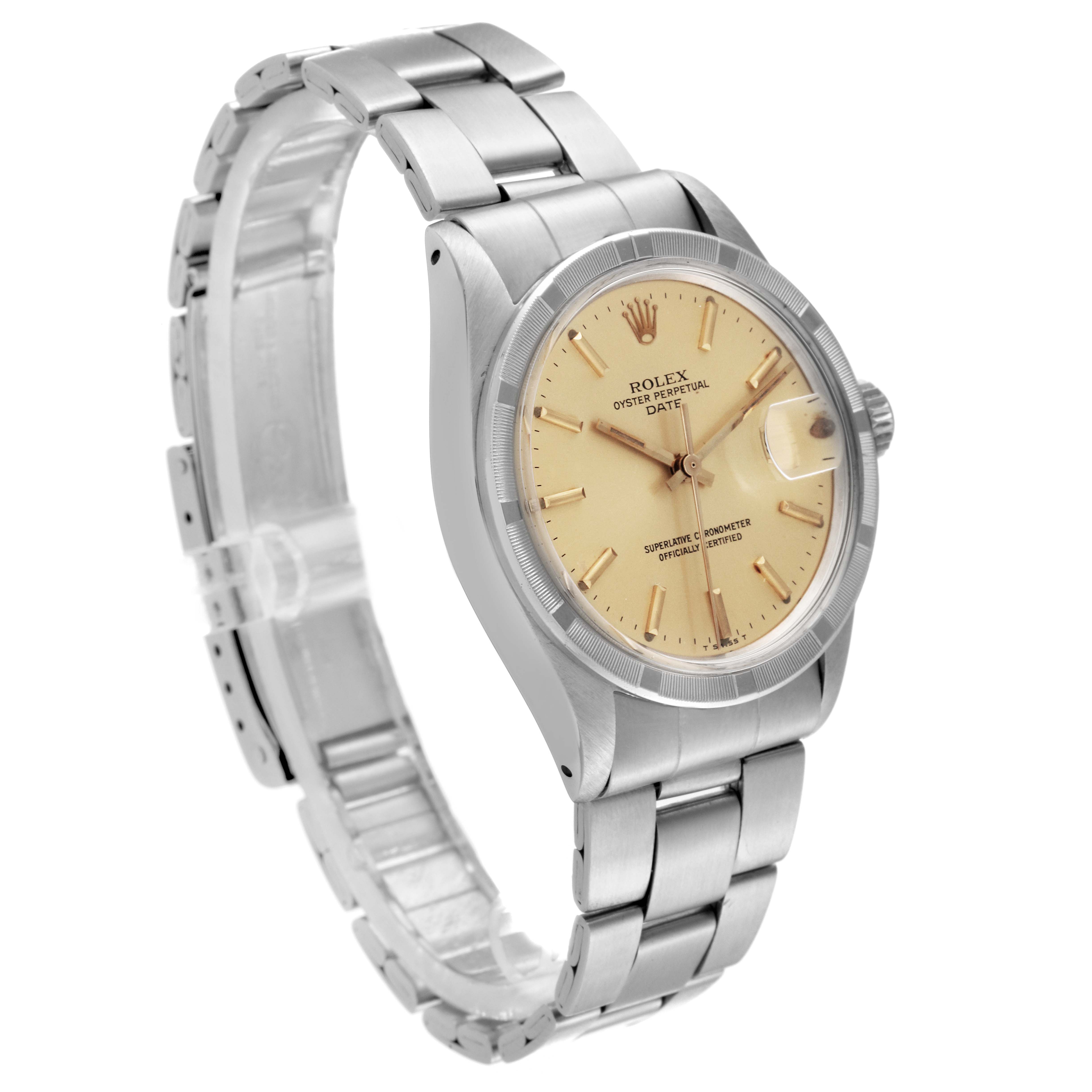 This Rolex Date 1501 Men's Stainless Steel Champagne Dial 1501 Men's Stainless Steel Champagne Dial model watch is shown at a slight angle, displaying the dial, bezel, and part of the stainless steel bracelet.