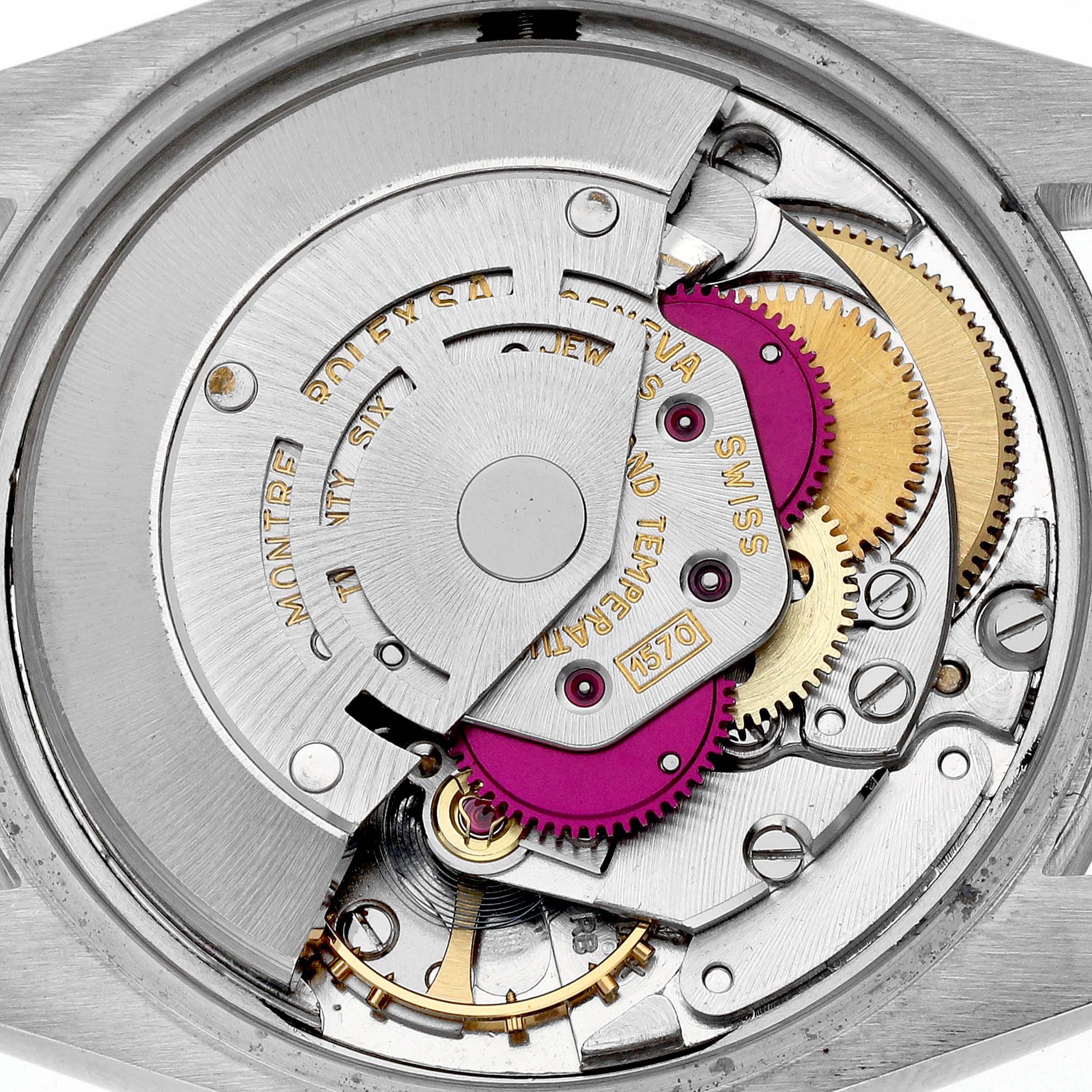 This image shows the intricate internal movement mechanism of a Rolex Date 1501 Men's Stainless Steel Champagne Dial 1501 Men's Stainless Steel Champagne Dial model watch from a top-down angle.