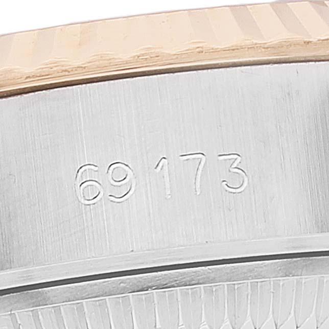 This image shows a close-up of the side of a Rolex Datejust 69173 Women's Steel and Gold (two tone) White Dial 69173 Women's Steel and Gold (two tone) White Dial watch case, displaying the model number "69173".