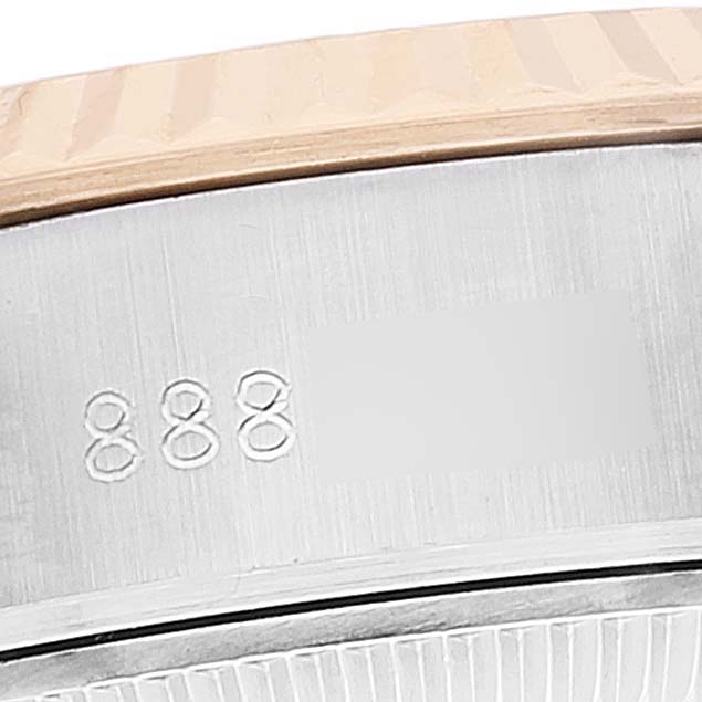 The image shows a close-up of the case side with part of the fluted bezel of a Rolex Datejust 69173 Women's Steel and Gold (two tone) White Dial 69173 Women's Steel and Gold (two tone) White Dial watch.