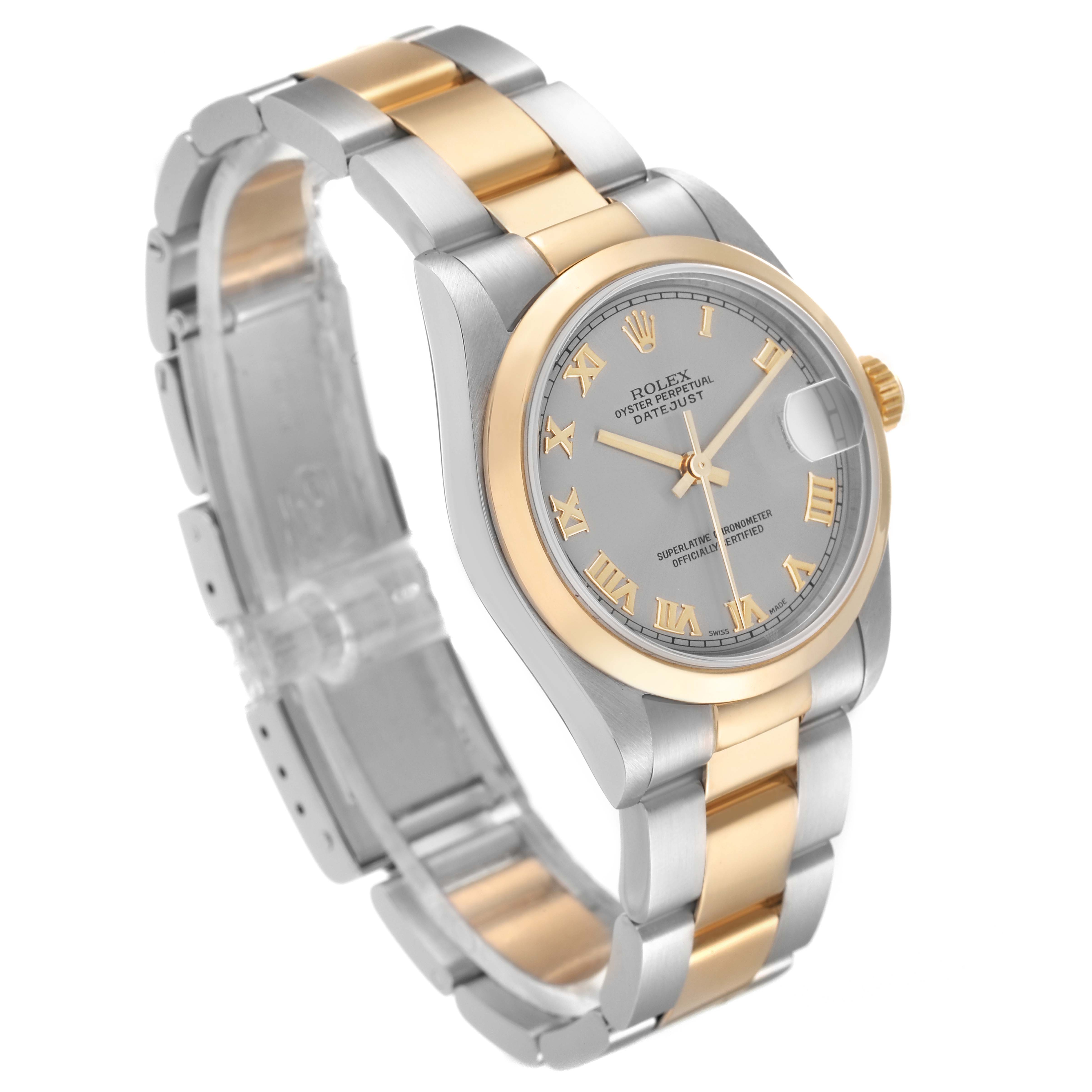 This Mid-Size Rolex watch is shown angled from the side, featuring the face, dial, and part of the two-tone metal bracelet.