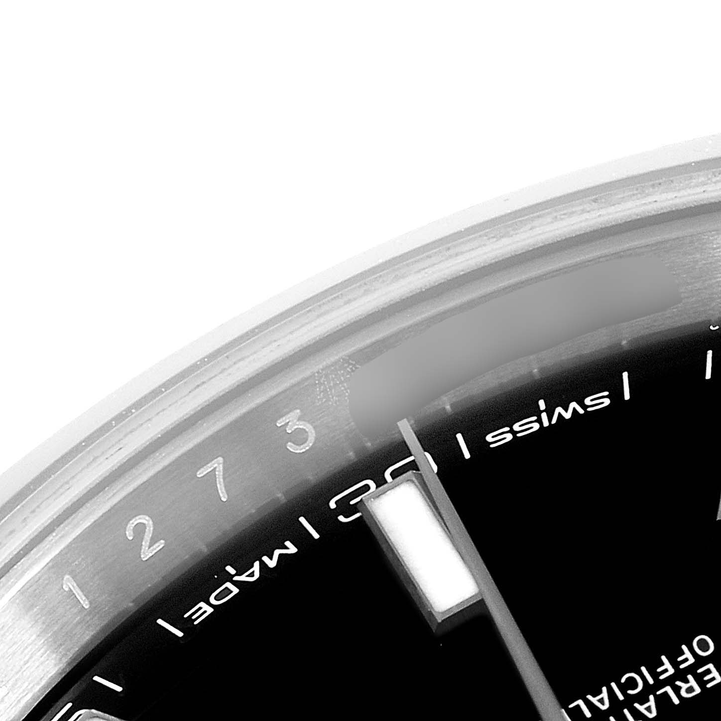 A partial view of the Rolex Datejust 41 126300 Men's Stainless Steel Black Dial 126300 Men's Stainless Steel Black Dial watch face, focusing on the hour marker and minute track.