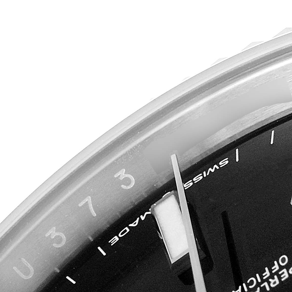 The image shows a close-up of the dial and hands of a Rolex Datejust 41 126334 Men
s Stainless Steel Black Dial 126334 Men
s Stainless Steel Black Dial watch, focusing on the "Swiss Made" text and part of the hour markers.