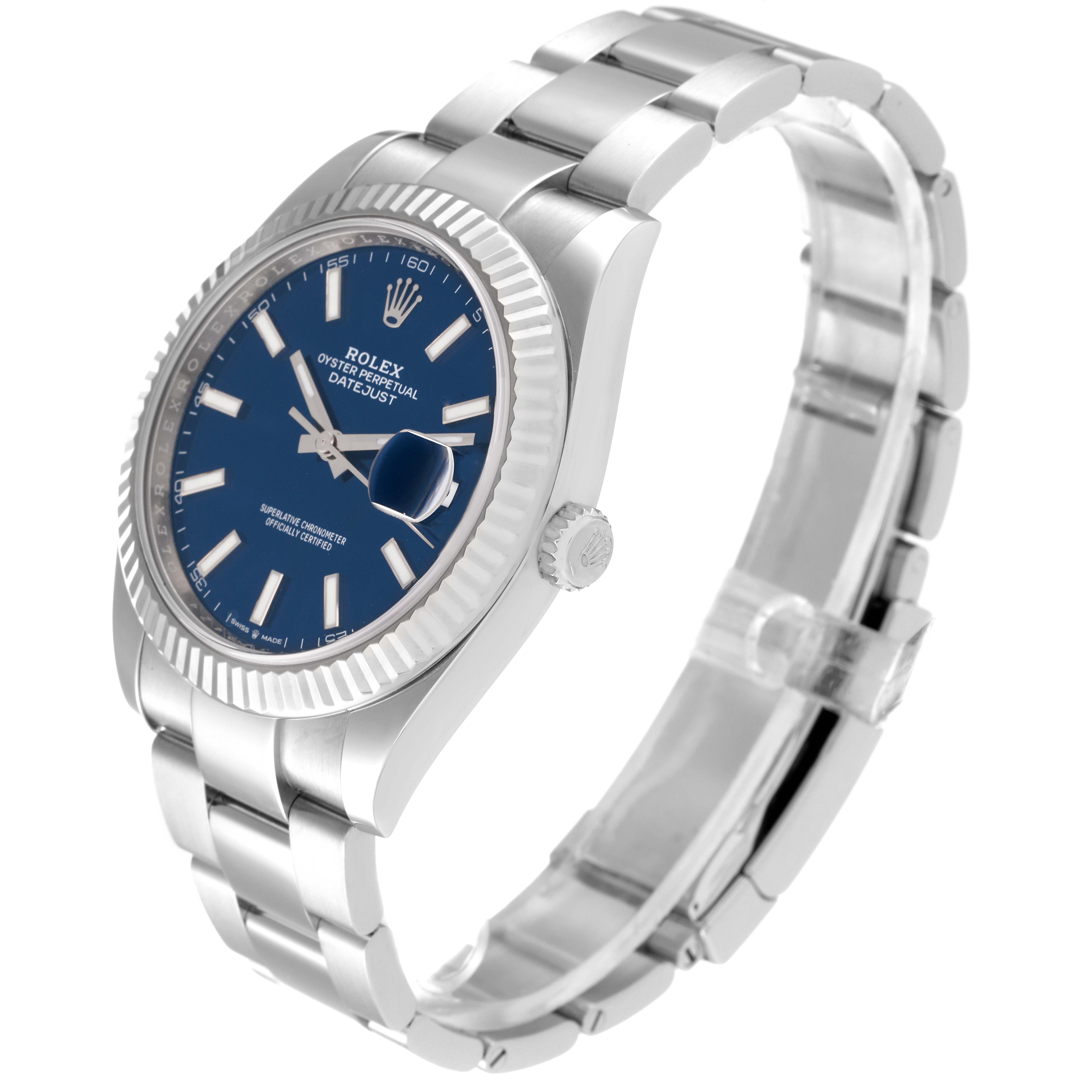 The image displays a Rolex Datejust 41 126334 Men's Stainless Steel Blue Dial 126334 Men's Stainless Steel Blue Dial from an angled side view, showcasing its blue dial, fluted bezel, and stainless steel bracelet.