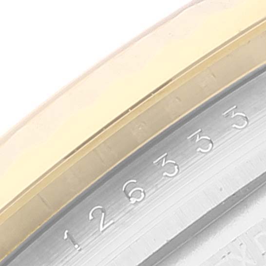 This is a close-up image of the bezel and a portion of the dial of the Rolex Datejust 41 126333 Men's Steel and Gold (two tone) Grey Dial 126333 Men's Steel and Gold (two tone) Grey Dial watch.