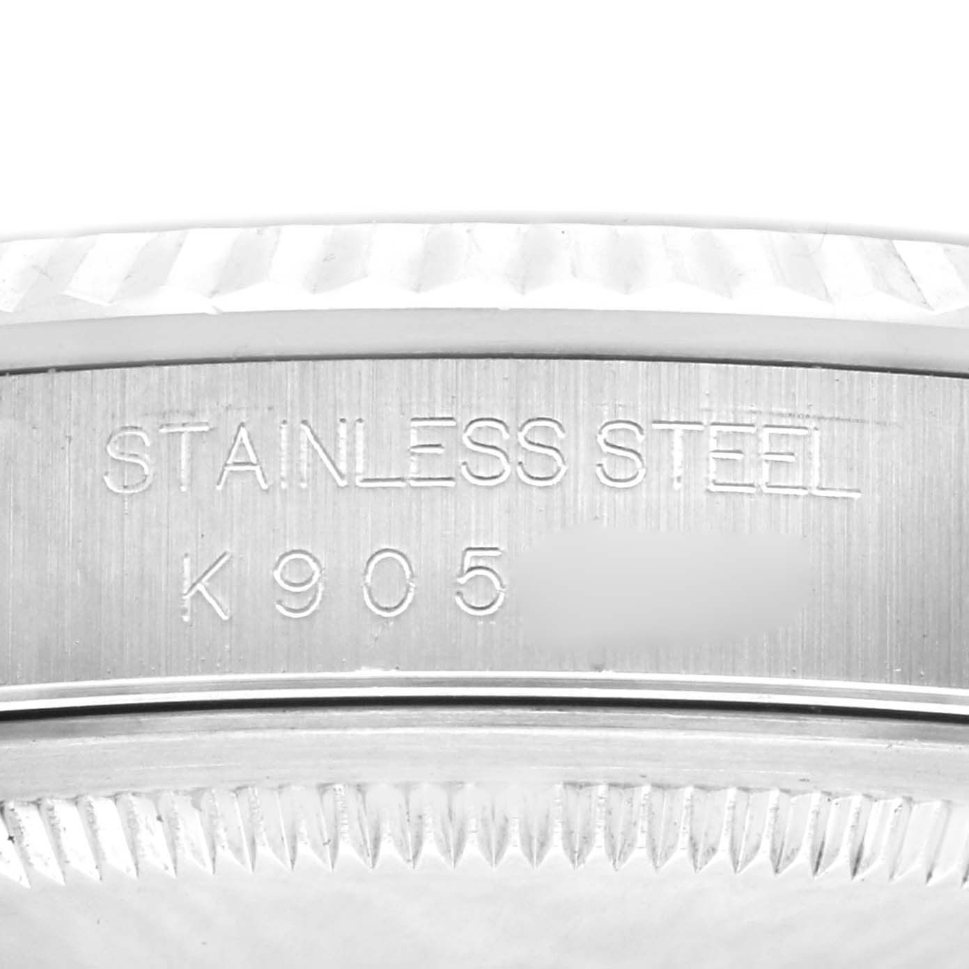 This image shows a close-up of the stainless steel with the serial number of a Rolex Datejust 16234 Men
s Stainless Steel Black Dial 16234 Men
s Stainless Steel Black Dial watch.