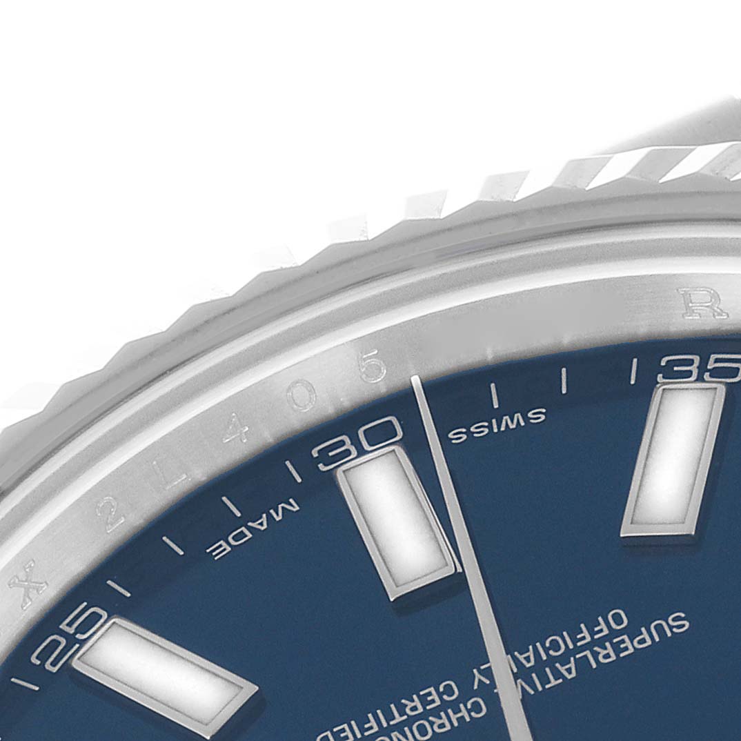 This image shows a close-up angle of the dial, markers, and part of the bezel of the Rolex Datejust 41 116334 Men
s Stainless Steel Blue Dial 116334 Men
s Stainless Steel Blue Dial model.