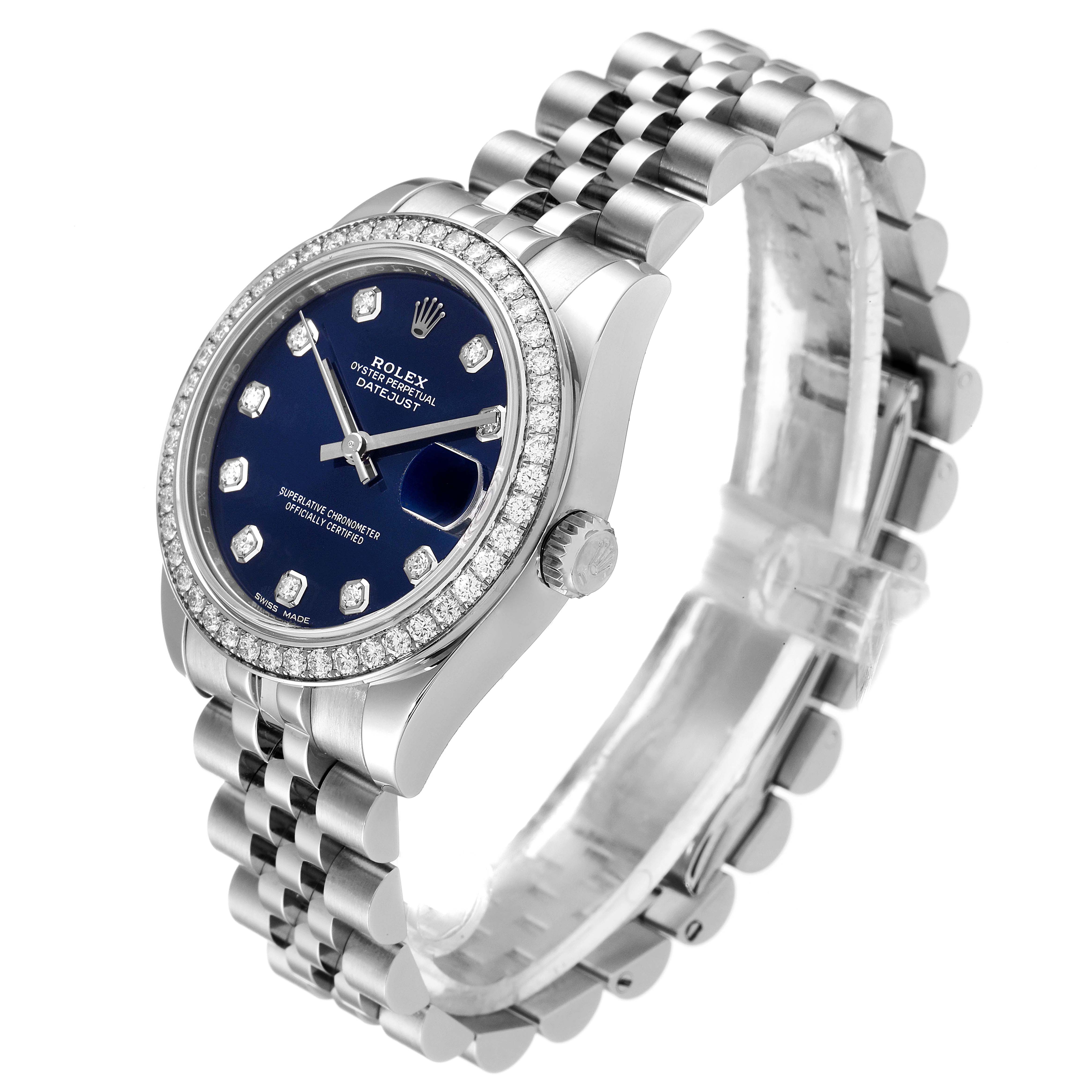 This image shows a Rolex Mid-Size 178384 Women's Stainless Steel Blue Dial 178384 Women's Stainless Steel Blue Dial Datejust watch at an angled view, featuring its blue dial, diamond bezel, and Jubilee bracelet.