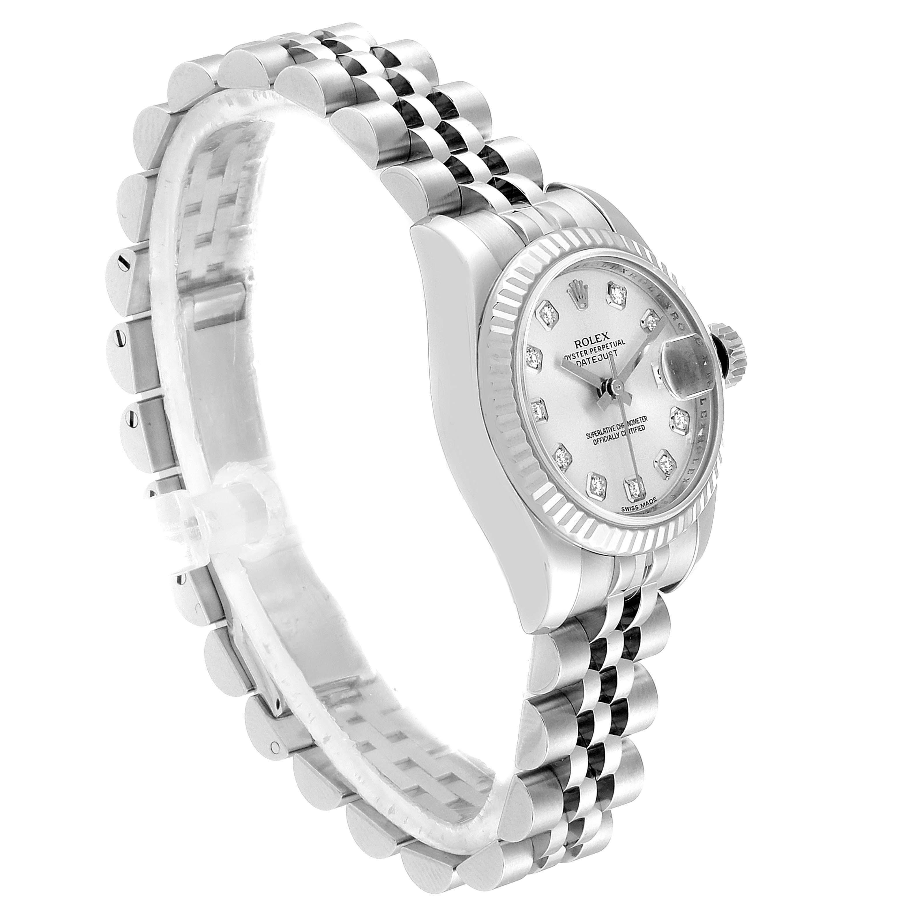 This image shows a side angle of the Rolex Datejust 179174 Women's Stainless Steel Silver Dial 179174 Women's Stainless Steel Silver Dial watch, highlighting its bezel, dial, and Jubilee bracelet.