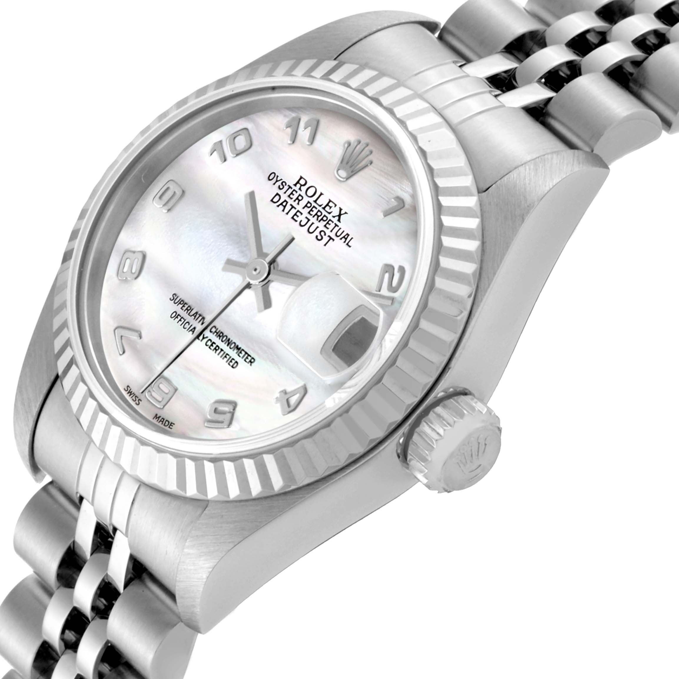 The image shows a close-up angled view of the Rolex Datejust 79174 Women
s Stainless Steel Mother of Pearl Dial 79174 Women
s Stainless Steel Mother of Pearl Dial watch, displaying the face, bezel, crown, and part of the bracelet.