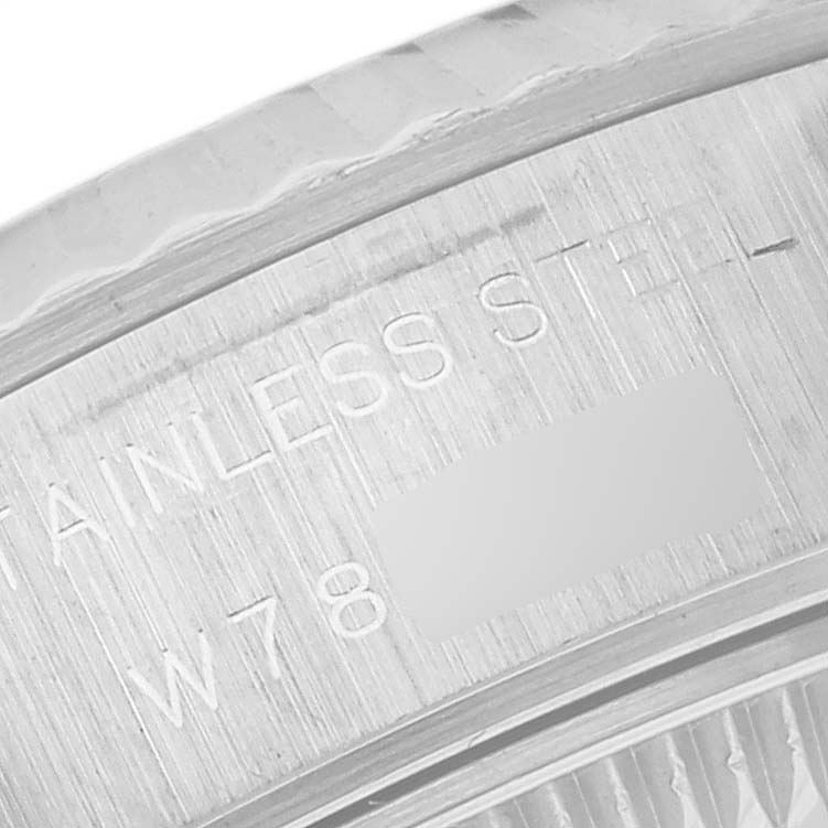 This image shows a close-up of the stainless steel caseback engraving of a Rolex Datejust 69174 Women's Stainless Steel Pink Dial 69174 Women's Stainless Steel Pink Dial watch.