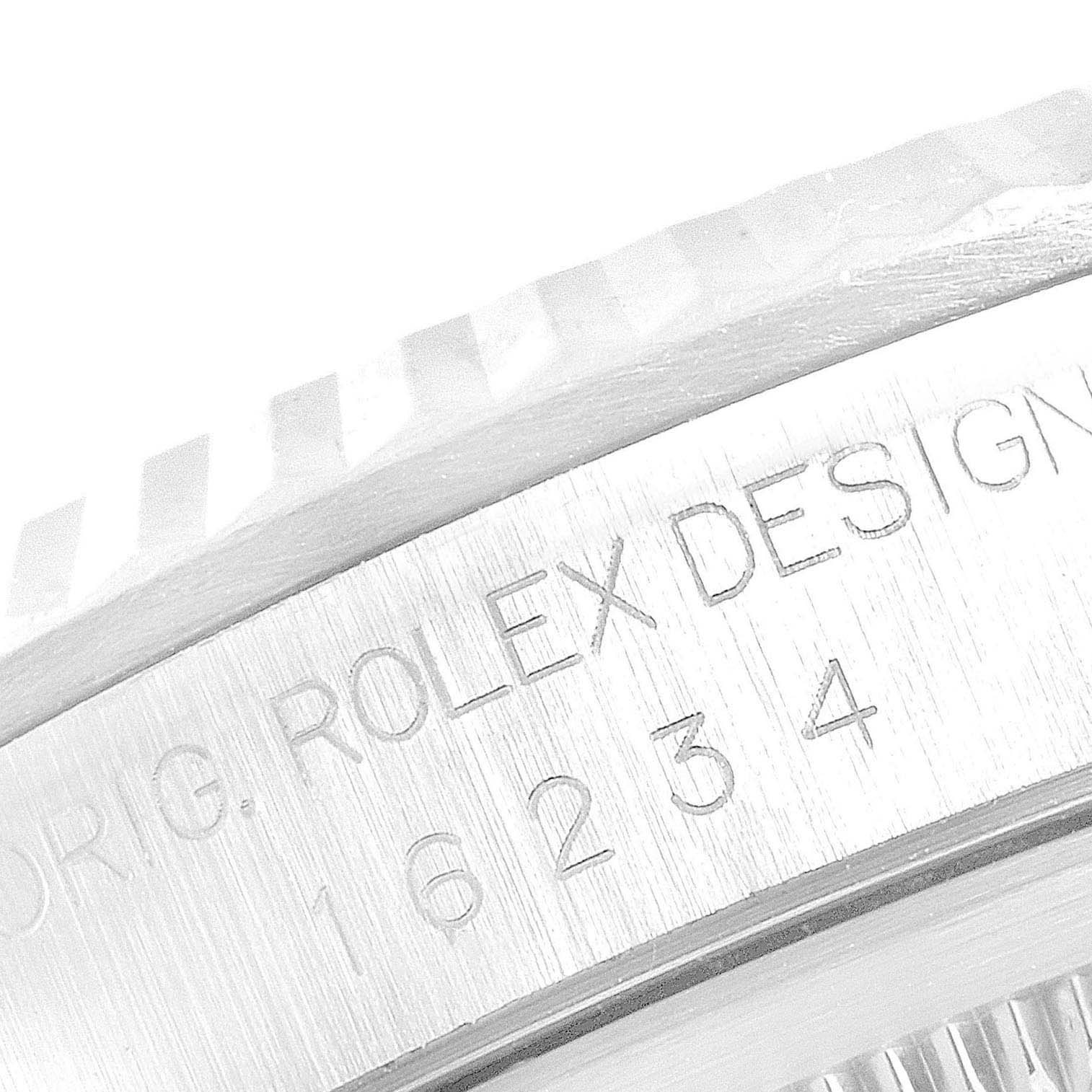 This image shows a close-up of the side engraving on the bezel of a Rolex Datejust 16234 Men's Stainless Steel Silver Dial 16234 Men's Stainless Steel Silver Dial watch, displaying the model number "16234".