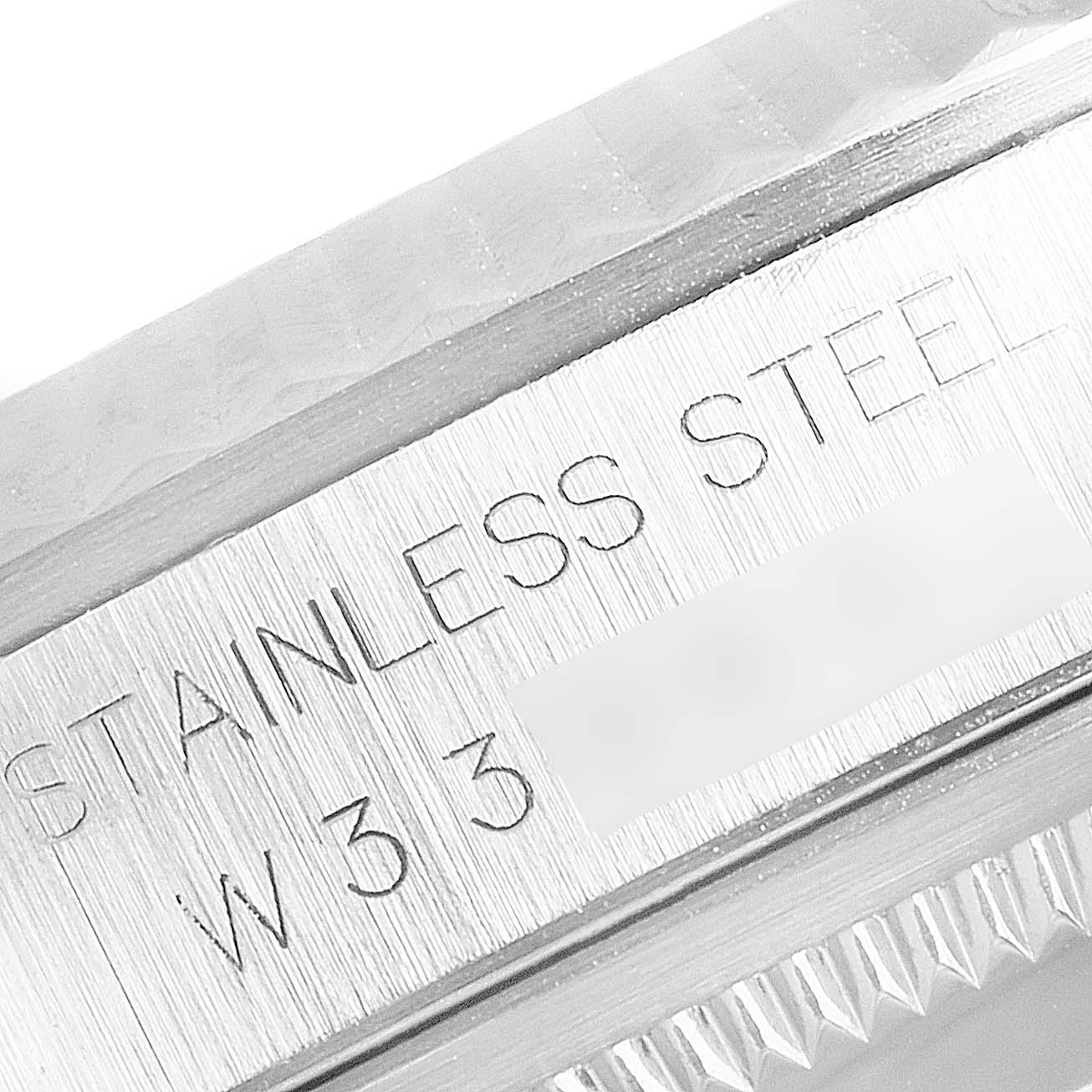 Close-up of the etched stainless steel bezel on a Rolex Datejust 16234 Men's Stainless Steel Silver Dial 16234 Men's Stainless Steel Silver Dial watch.