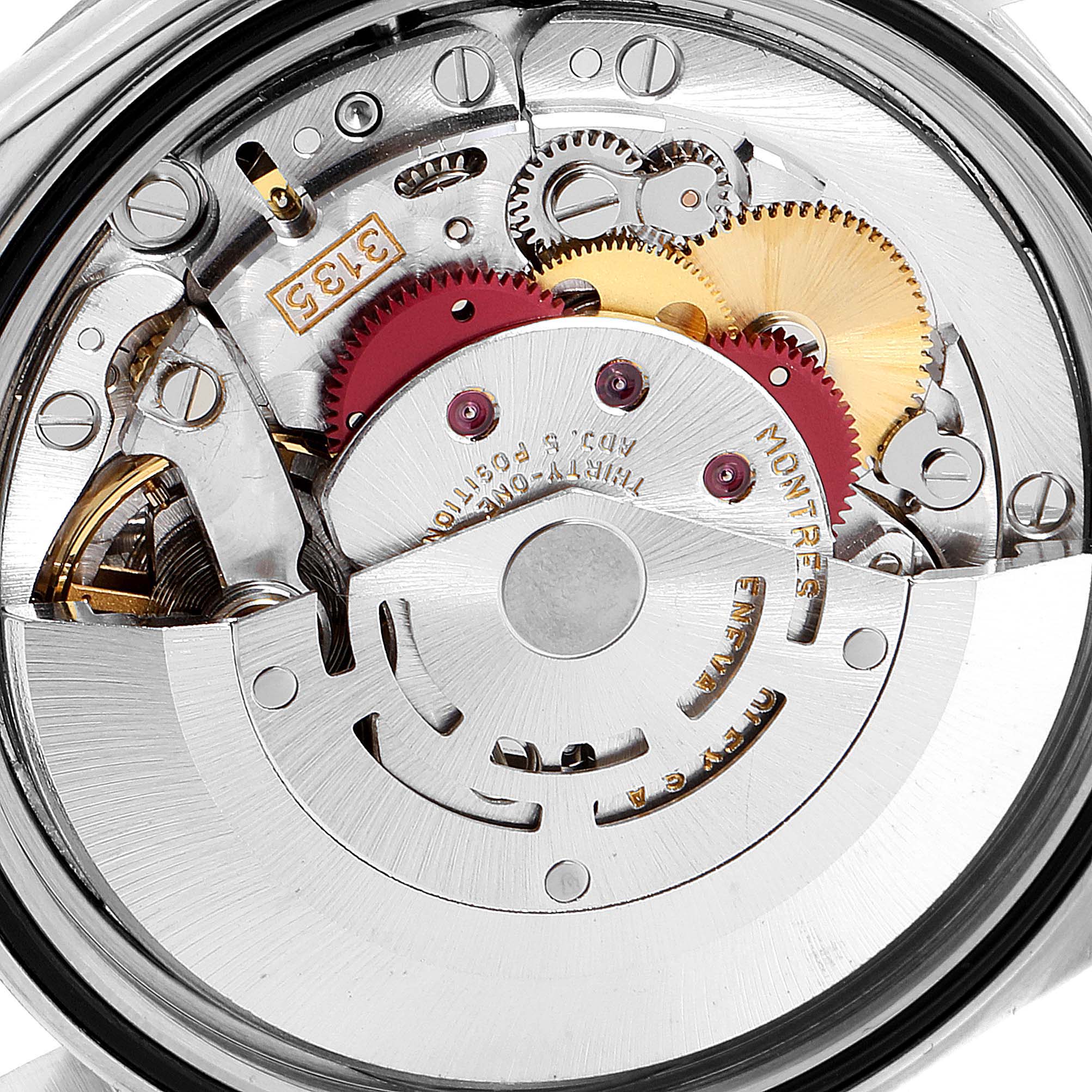 This image shows a close-up of the movement parts inside a Rolex Datejust 16234 Men's Stainless Steel Silver Dial 16234 Men's Stainless Steel Silver Dial watch, highlighting gears and mechanisms.