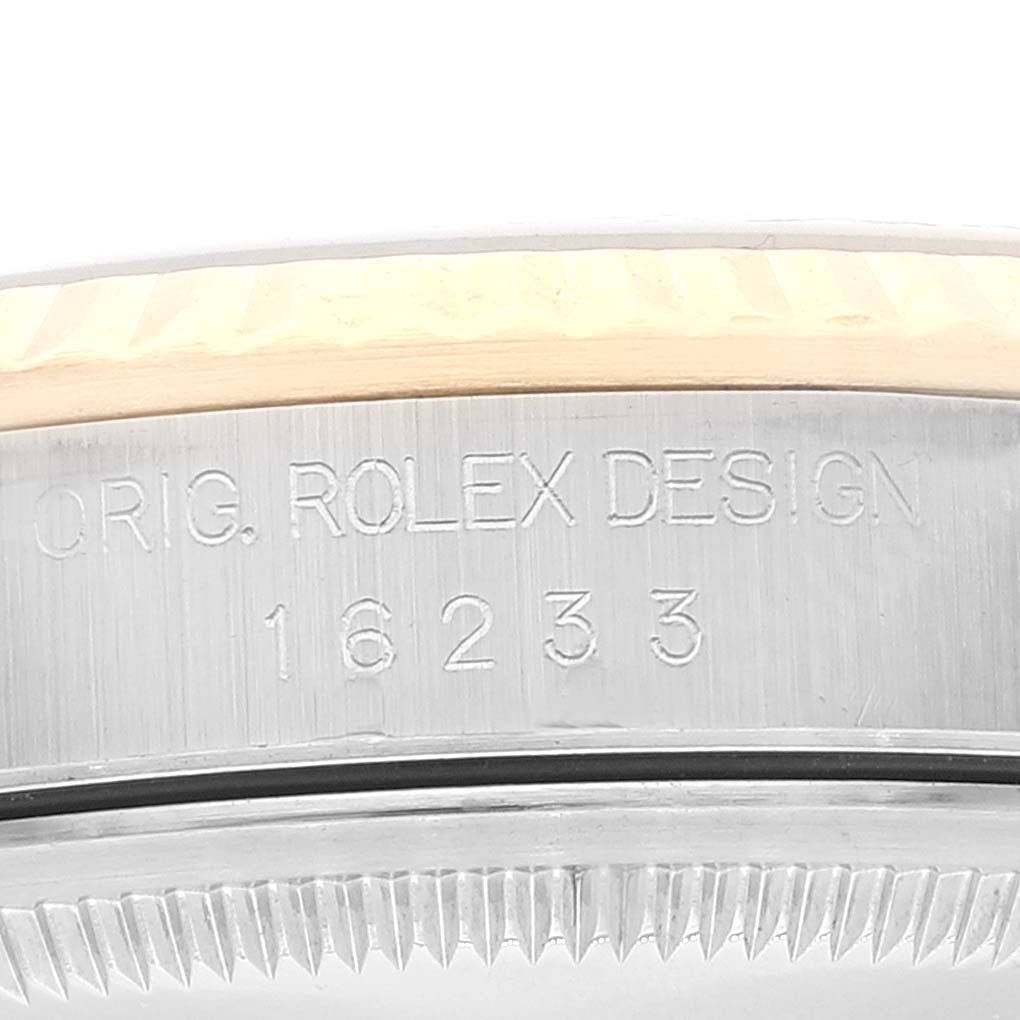 This image shows a close-up view of the side casing of the Rolex Datejust 16233 Men's Steel and Gold (two tone) Black Dial 16233 Men's Steel and Gold (two tone) Black Dial, highlighting the "ORG. ROLEX DESIGN" engraving and model number 16233.