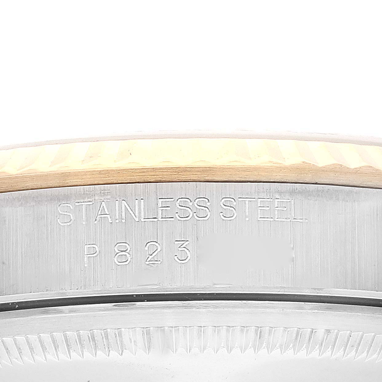The image shows a close-up of the stainless steel case back of a Rolex Datejust 16233 Men's Steel and Gold (two tone) Black Dial 16233 Men's Steel and Gold (two tone) Black Dial model.