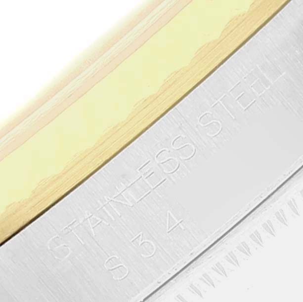 The image shows a close-up of the case side of a Rolex Datejust 16233 Men's Steel and Gold (two tone) Black Dial 16233 Men's Steel and Gold (two tone) Black Dial watch, focusing on the stainless steel and gold sections.