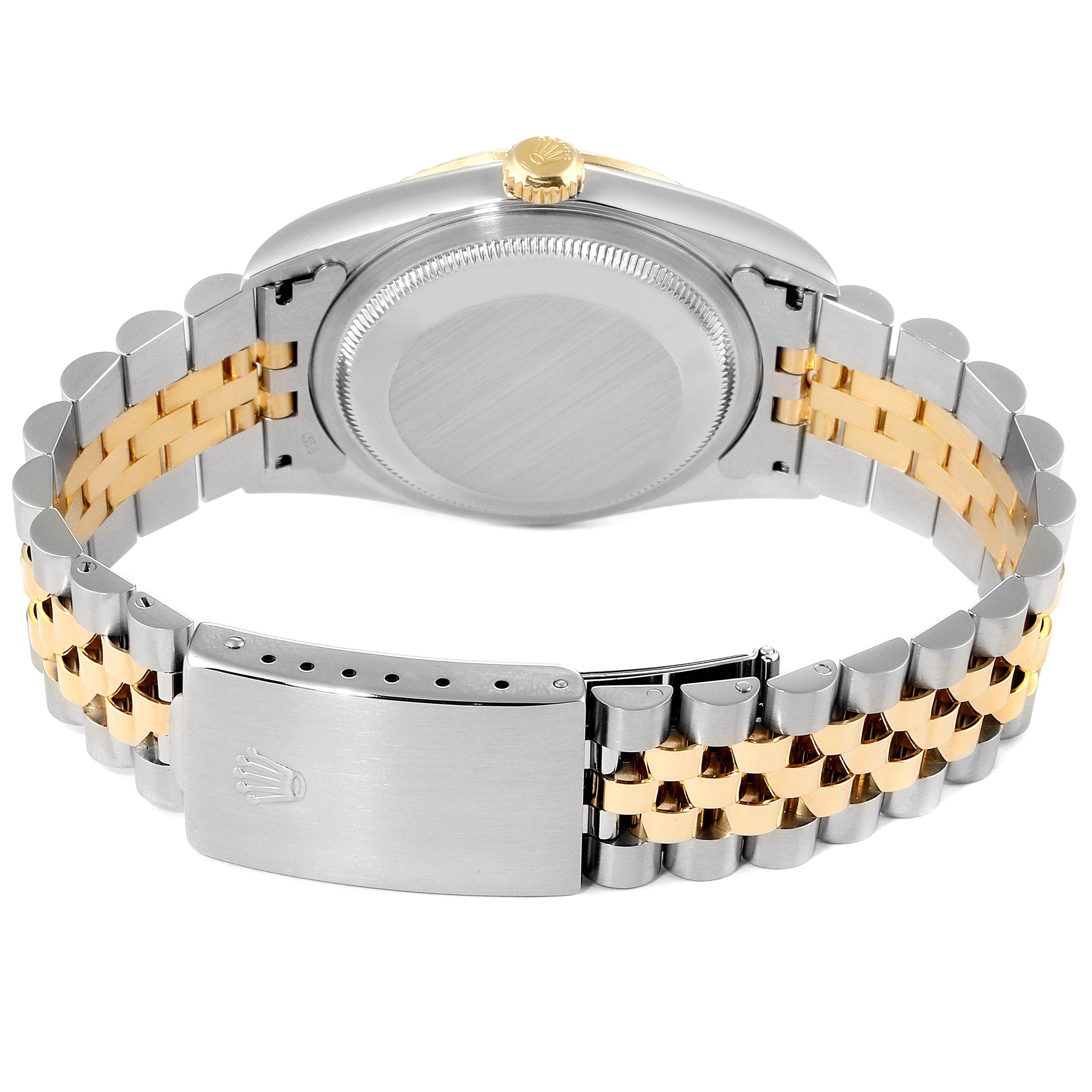 The image shows the back and bracelet of a Rolex Datejust 16233 Men's Steel and Gold (two tone) Blue Dial 16233 Men's Steel and Gold (two tone) Blue Dial watch with a two-tone metal band.