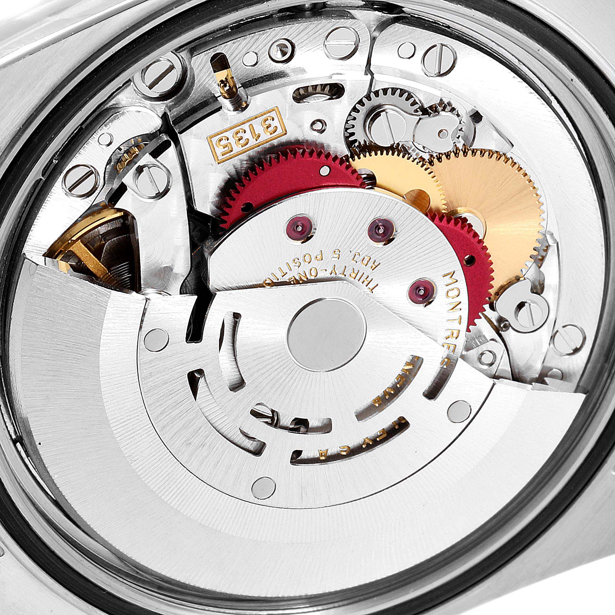 This image shows a close-up view of the movement mechanism inside a Rolex Datejust 16233 Men's Steel and Gold (two tone) Blue Dial 16233 Men's Steel and Gold (two tone) Blue Dial watch.