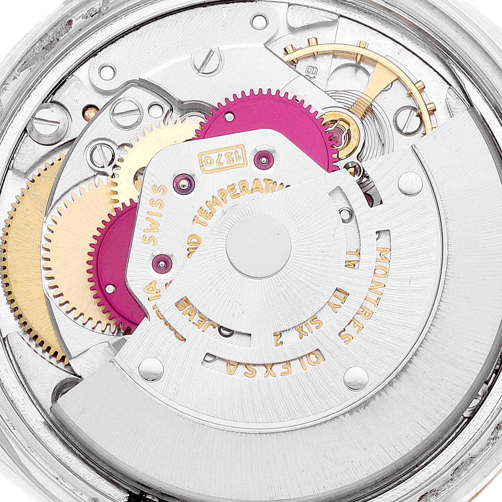 The image shows the intricate inner mechanical movement of the Vintage Collection model by Rolex, highlighting gears and inscriptions.