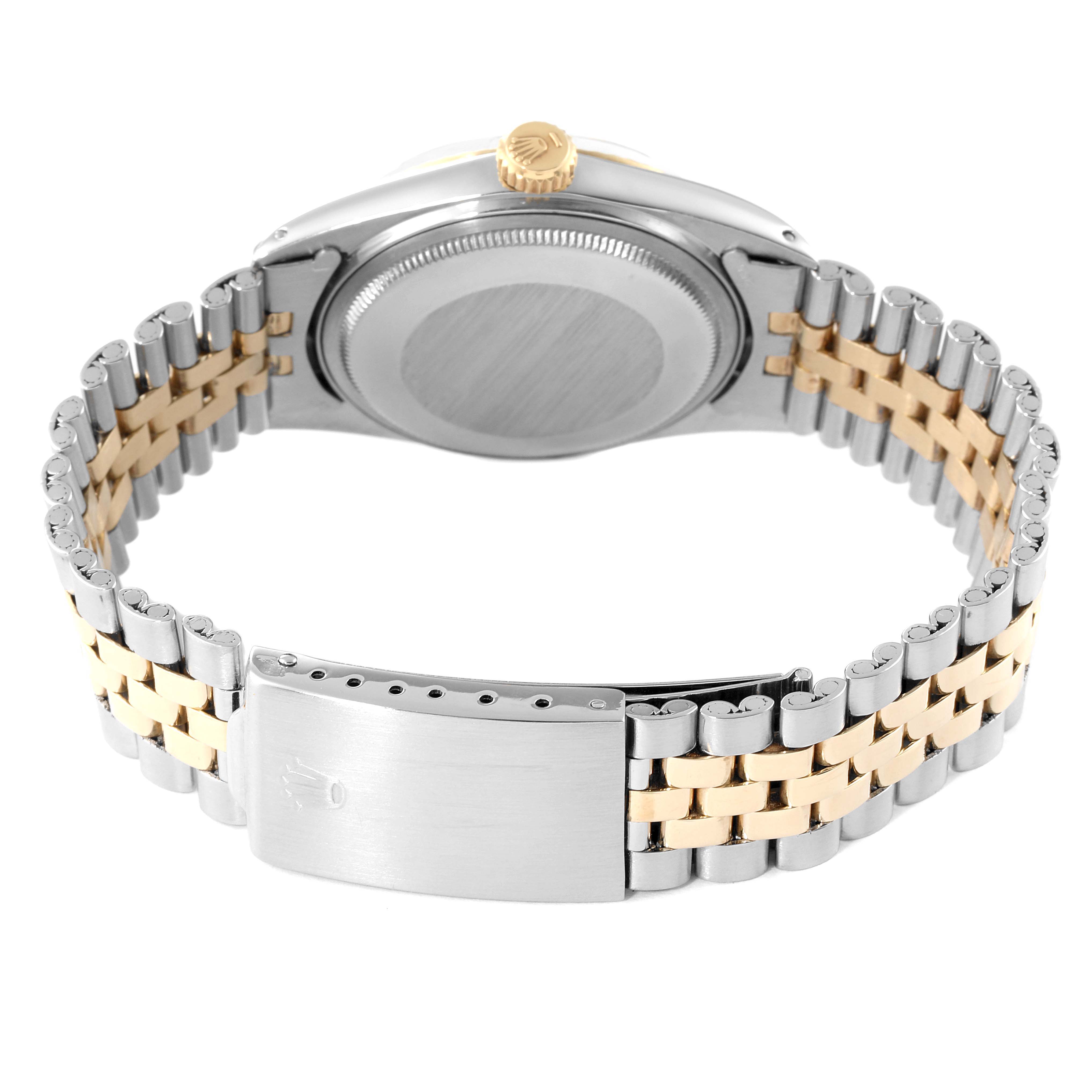 The image shows the back view of a Vintage Collection Rolex watch, highlighting its two-tone bracelet and clasp.