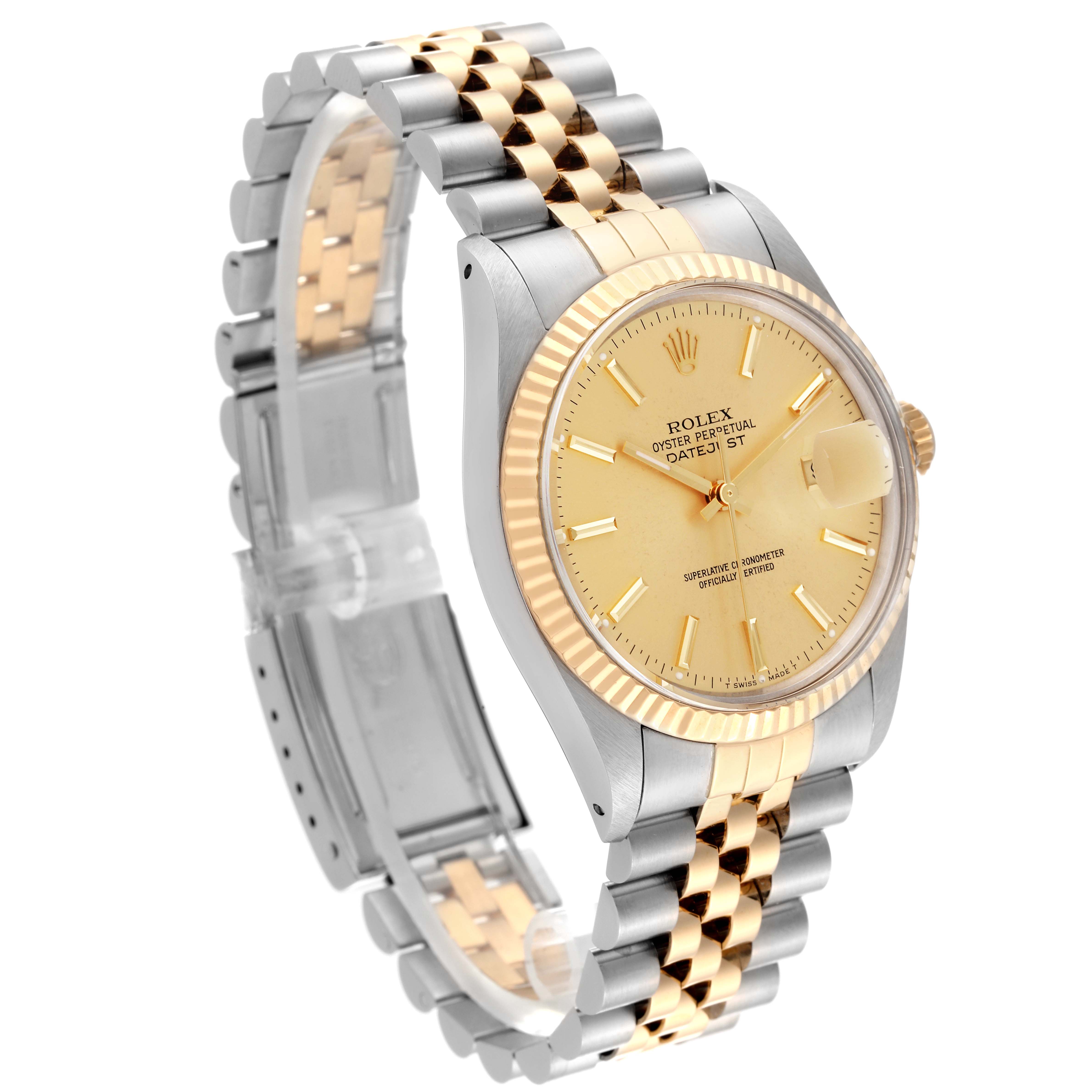 The Vintage Collection Rolex watch is shown at a 3/4 angle, highlighting the gold dial, jubilee bracelet, and fluted bezel.