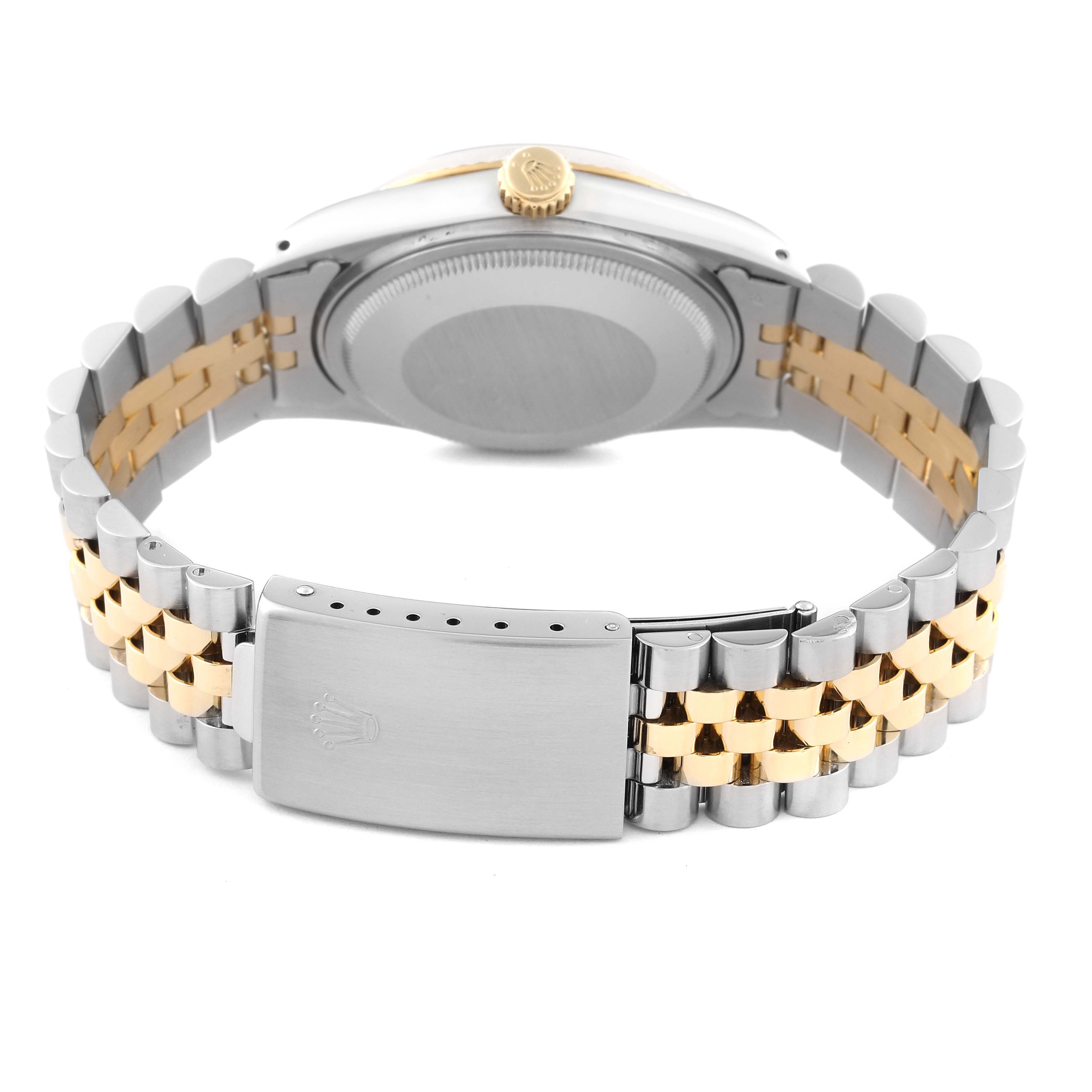 This image shows the back case and bracelet of a Rolex Vintage Collection 16013 Men's Steel and Gold (two tone) Champagne Dial 16013 Men's Steel and Gold (two tone) Champagne Dial watch, emphasizing the two-tone metal design and clasp.