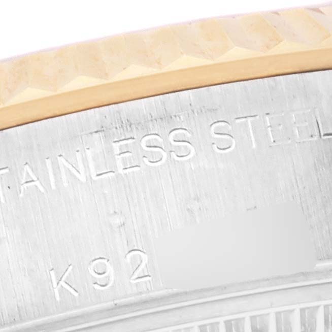 The image shows a close-up of the side of a Rolex Datejust 79173 Women's Steel and Gold (two tone) White Dial 79173 Women's Steel and Gold (two tone) White Dial watch, highlighting its stainless steel case and part of the bezel.