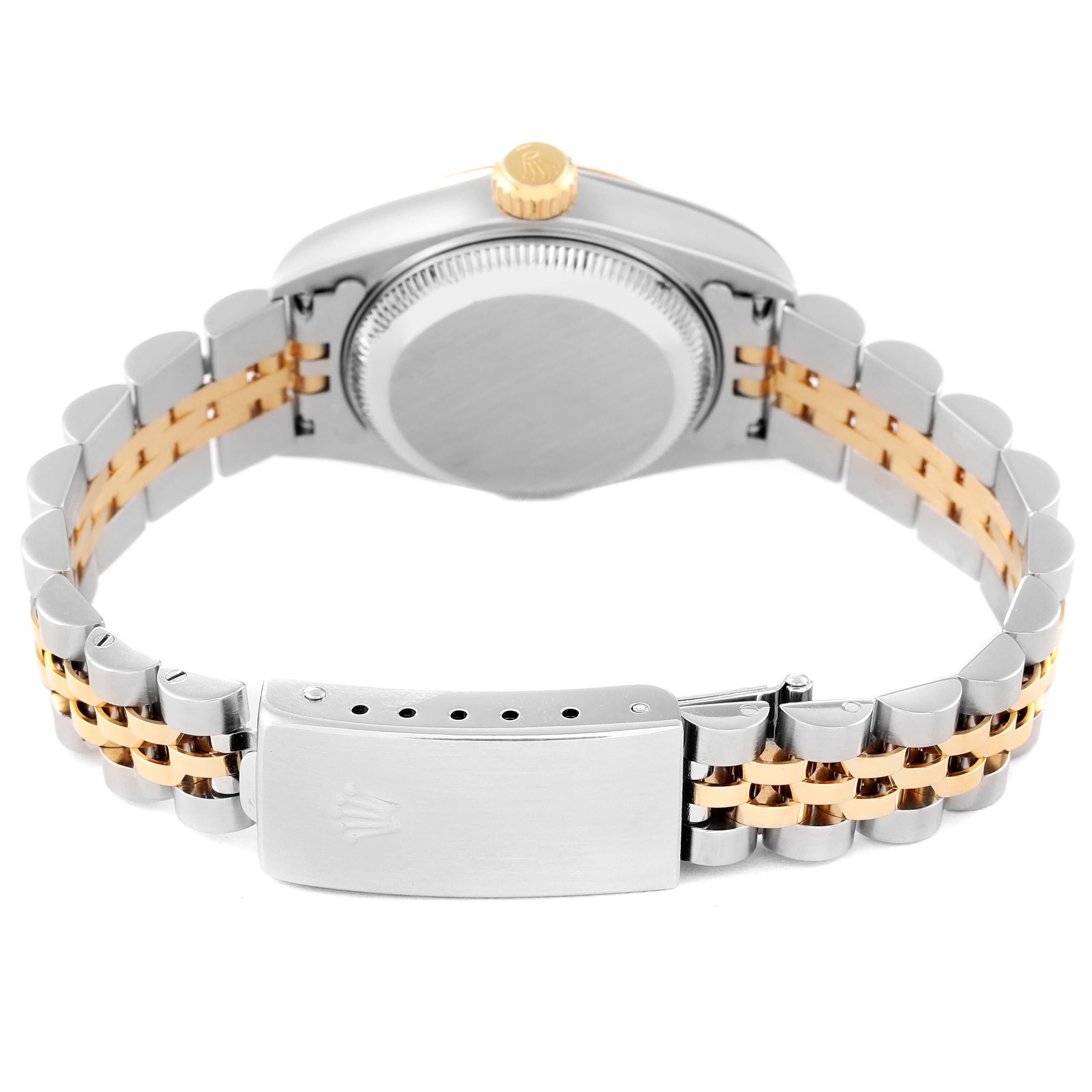The image shows the back view of a Rolex Datejust 79173 Women's Steel and Gold (two tone) White Dial 79173 Women's Steel and Gold (two tone) White Dial watch, highlighting the case back, crown, and two-tone bracelet with a clasp.